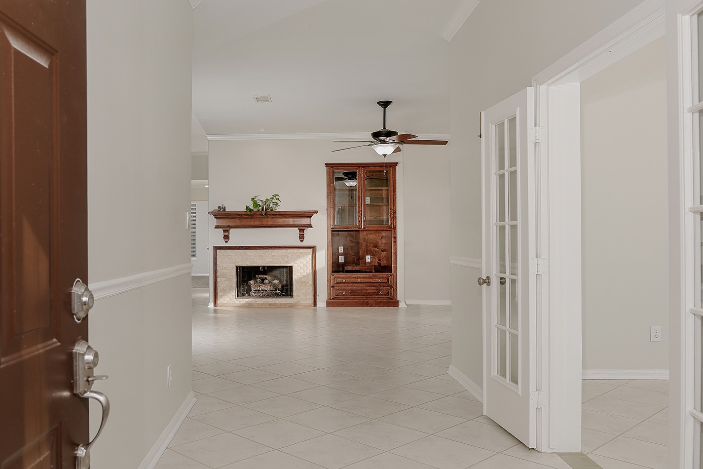 View from the entryway towards the family room and the private study to the right. View from the entryway towards the family room and the private study to the right.