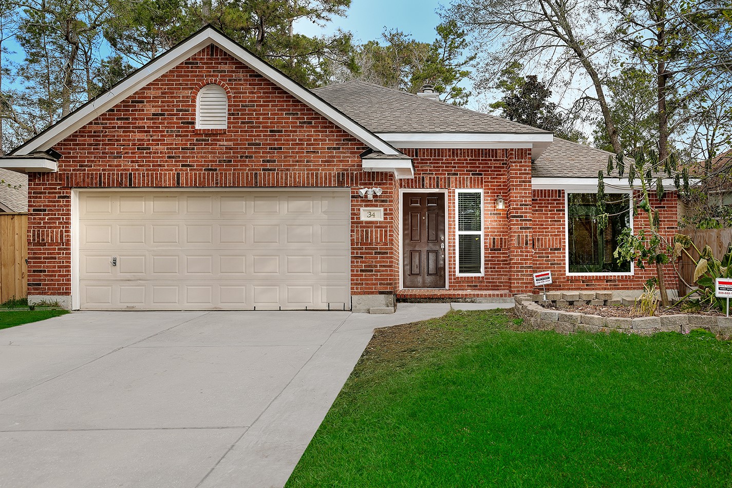 Charming brick single-story home with a two-car garage and a neatly landscaped front yard. Features a welcoming front door and large windows, offering great curb appeal in a serene neighborhood setting. Charming brick single-story home with a two-car garage and a neatly landscaped front yard. Features a welcoming front door and large windows, offering great curb appeal in a serene neighborhood setting.