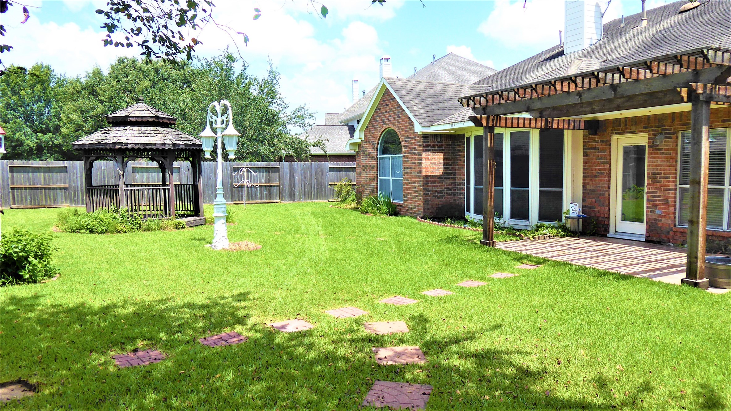 view of the back yard. please note the gazebo was taken down due to its conditions