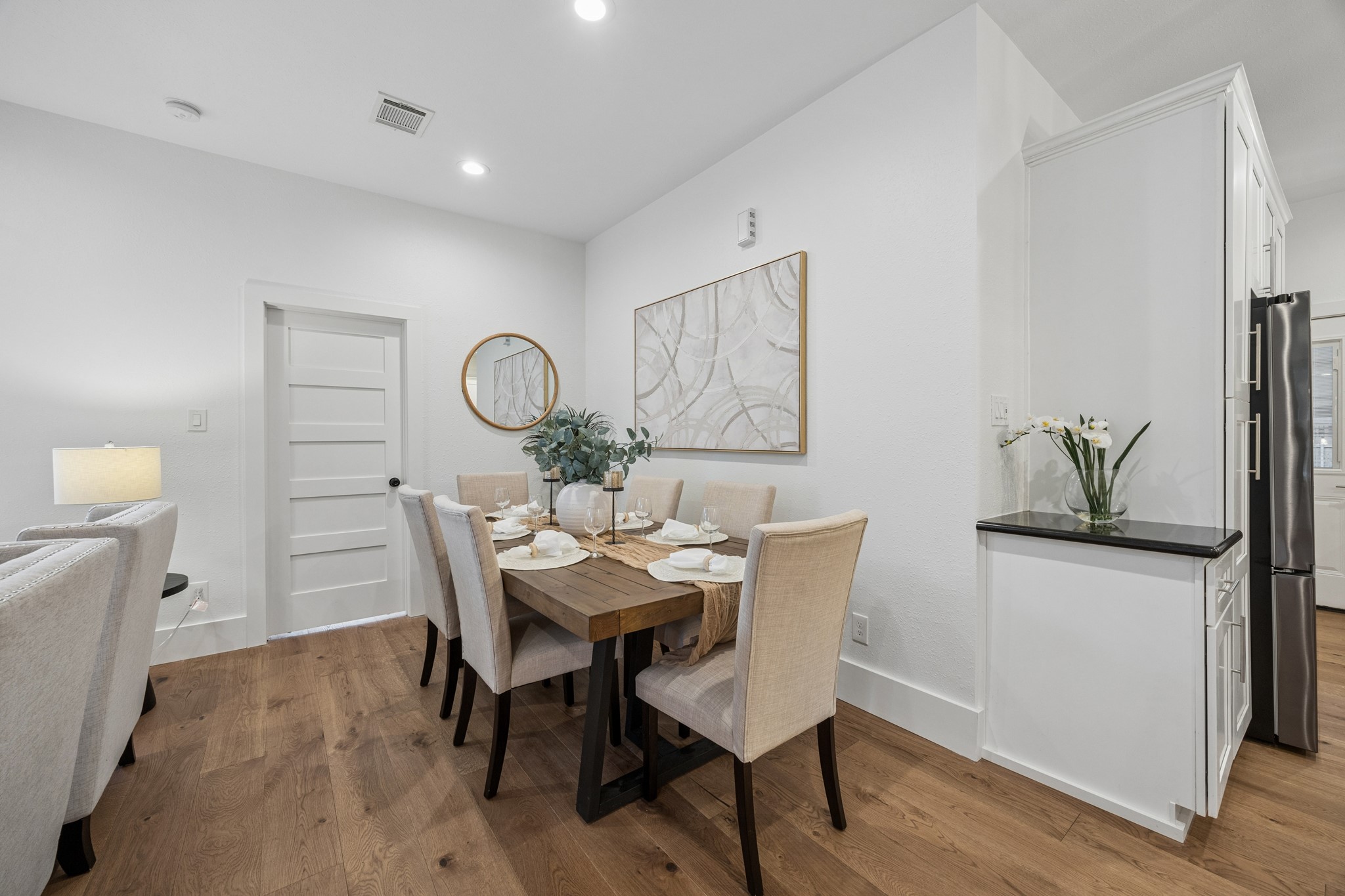 Dining area in the open concept living room and kitchen.