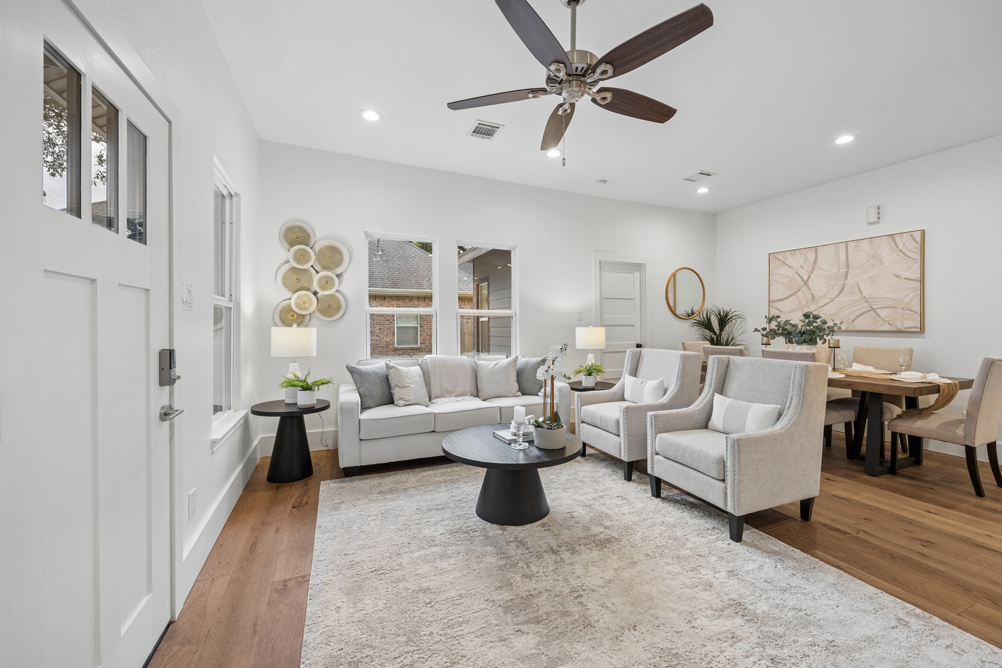 Bright and inviting living area seamlessly flowing into the dining space.