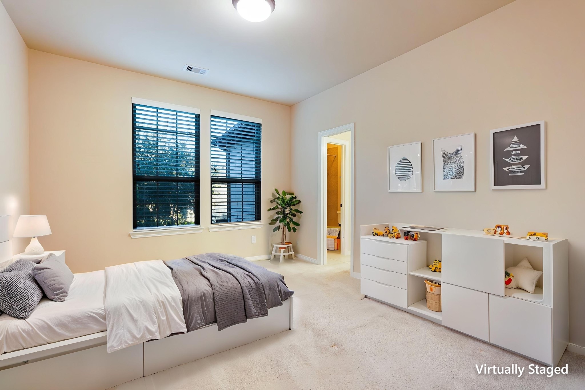 SECOND Flr-Bed#3: *Virtually Staged* This is a bright, cozy bedroom with neutral walls and carpet. It features two large windows with blinds and an en-suite bathroom. Perfect for a peaceful retreat.