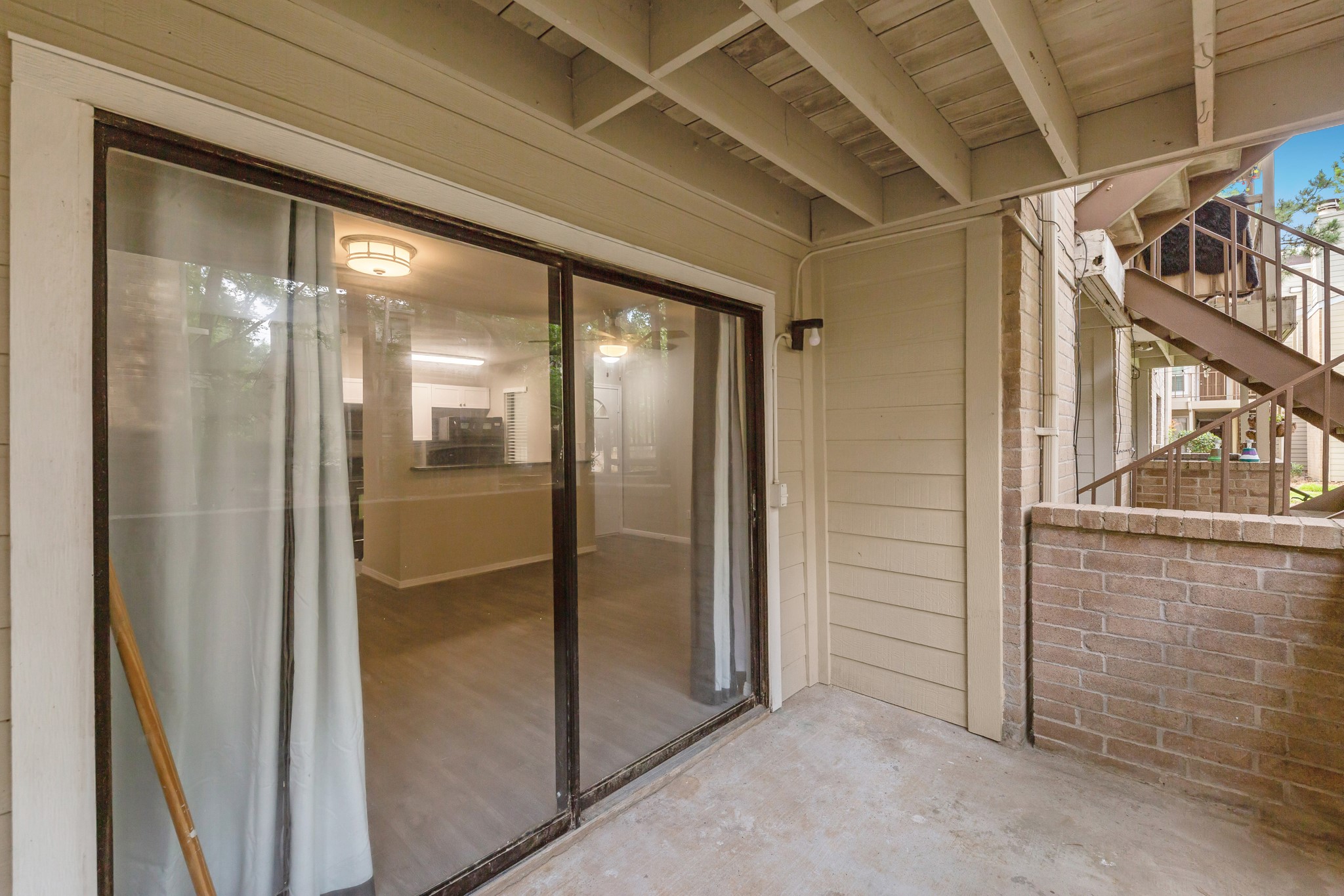 The large patio allows for indoor/outdoor living and is perfect for enjoying the outdoors.