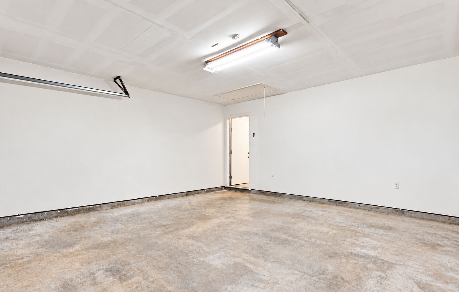 The laundry room leads into the two car garage!