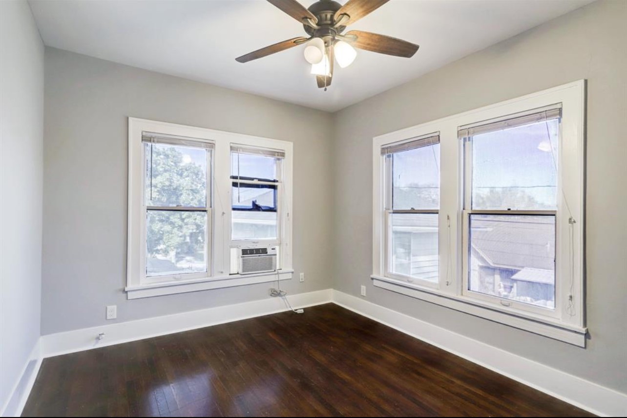 One of the three bedrooms in the upstairs unit.