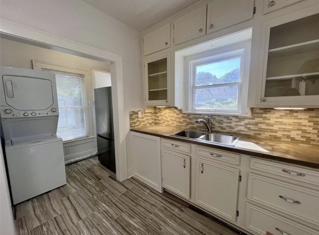 Each unit has an updated kitchen and its own stackable washer and dryer.
