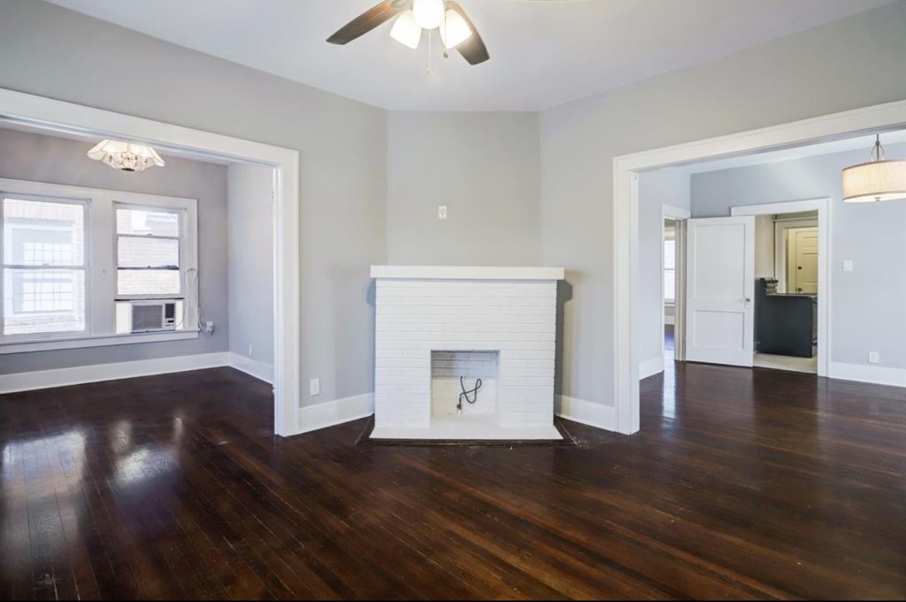 The units have spacious living rooms with a fireplace accent and hardwood floors throughout. The units have spacious living rooms with a fireplace accent and hardwood floors throughout.