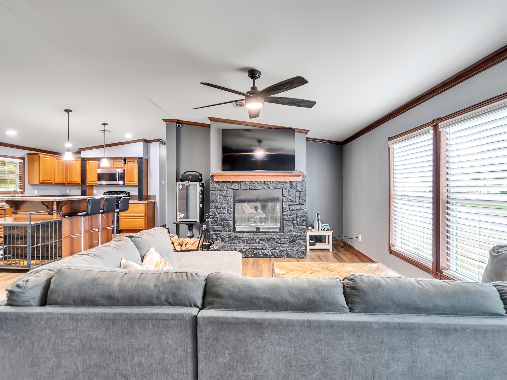 Living room with wood burning fireplace