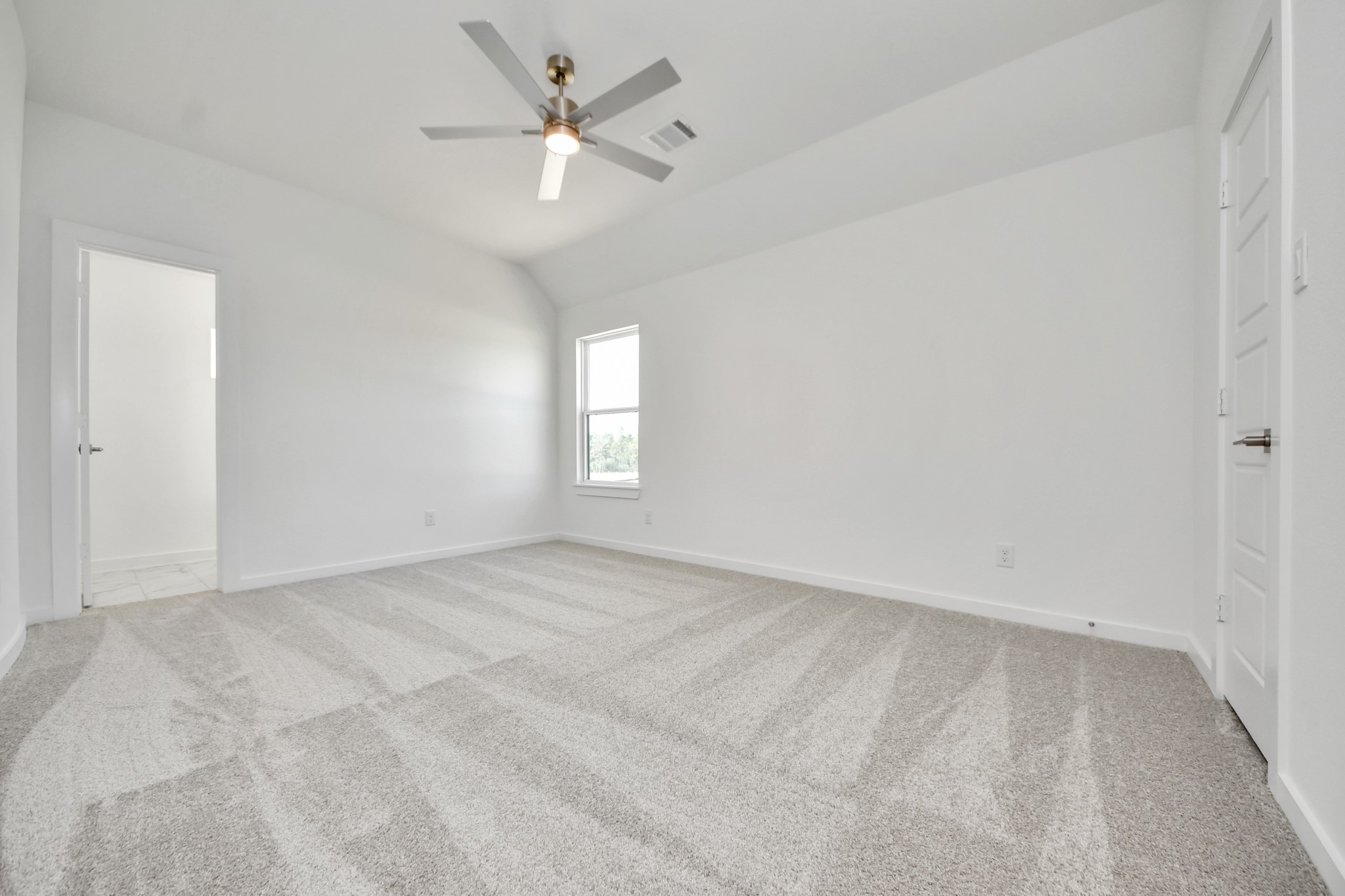 Generously sized secondary bedrooms featuring spacious closets, soft and inviting carpeting underfoot, large windows allowing plenty of natural light, and the added touch of privacy blinds for your personal retreat.