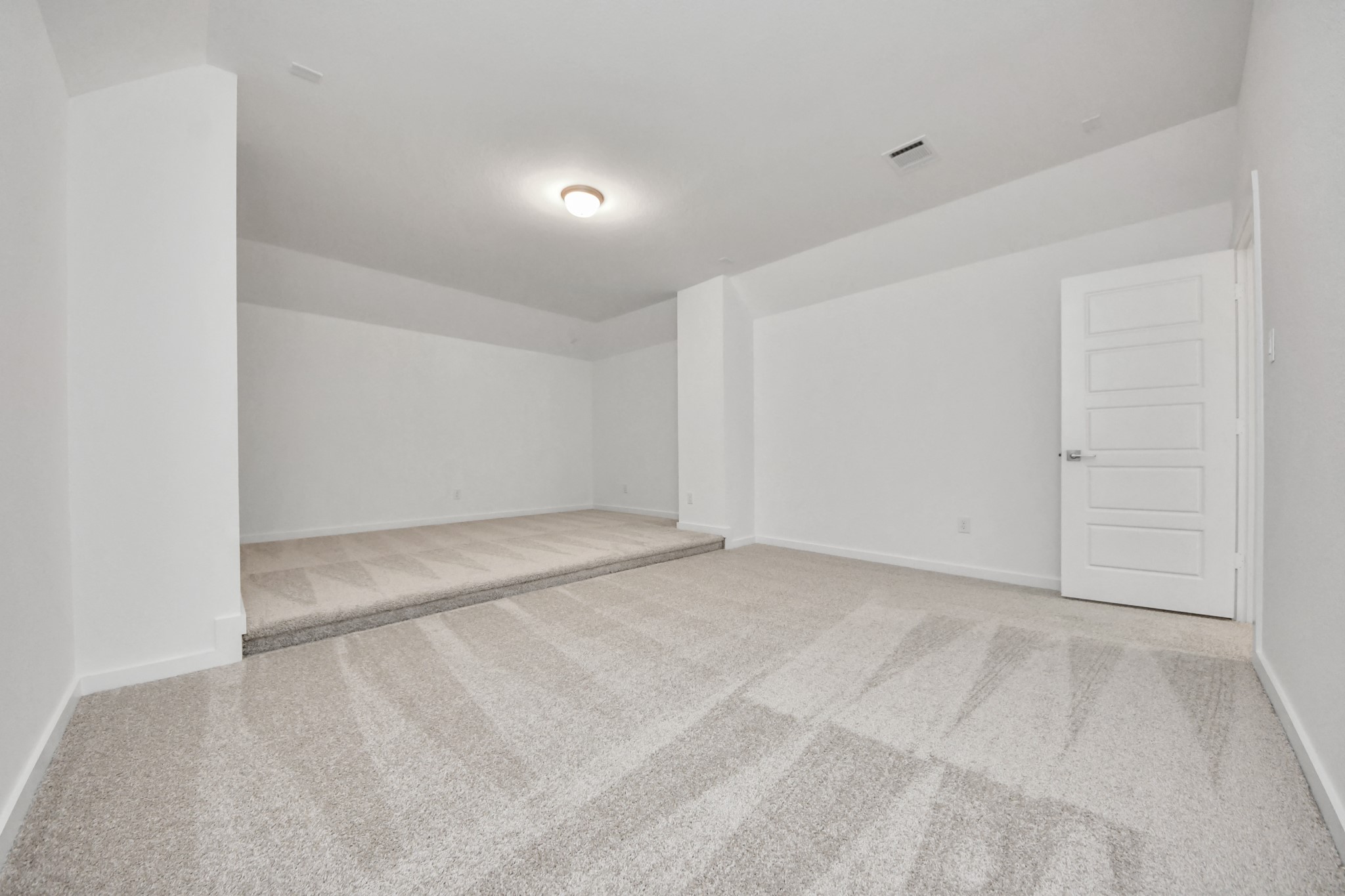 Take a look at this stunning and spacious media room.