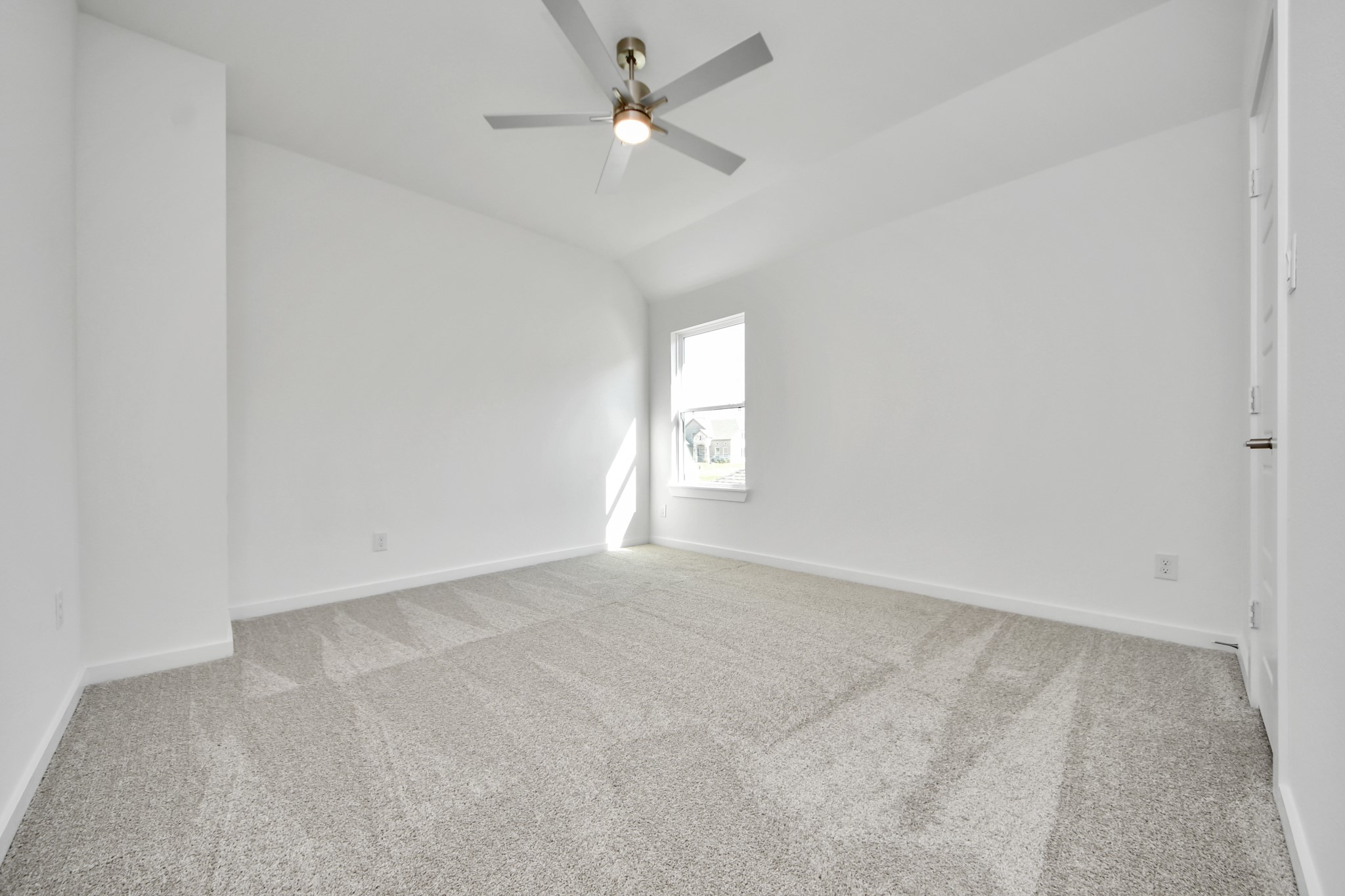 Generously sized secondary bedrooms featuring spacious closets, soft and inviting carpeting underfoot, large windows allowing plenty of natural light, and the added touch of privacy blinds for your personal retreat.