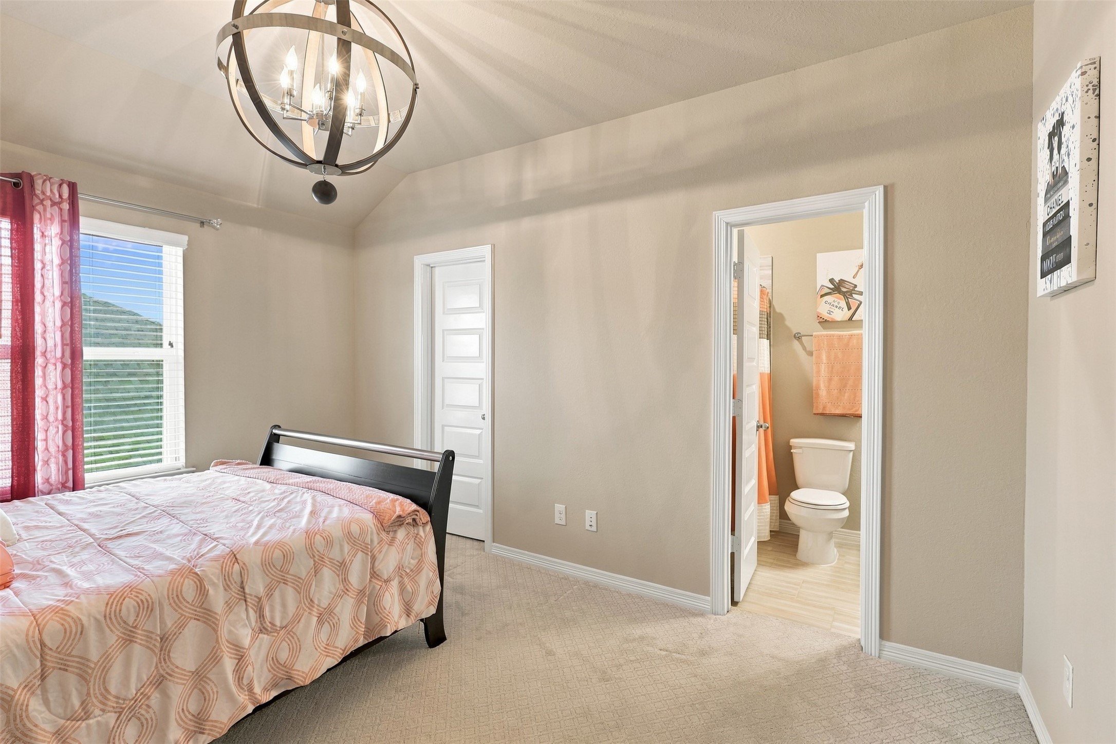 WHAT A WONDERFUL PRIVATE GUEST SUITE! Thoughtfully tucked away for added privacy, this inviting retreat is perfect for visiting guests or family members who appreciate having their own special space! Enjoy the comfort of a spacious room and a generous walk-in closet offering plenty of storage! A WONDERFUL feature that makes this home even more special!