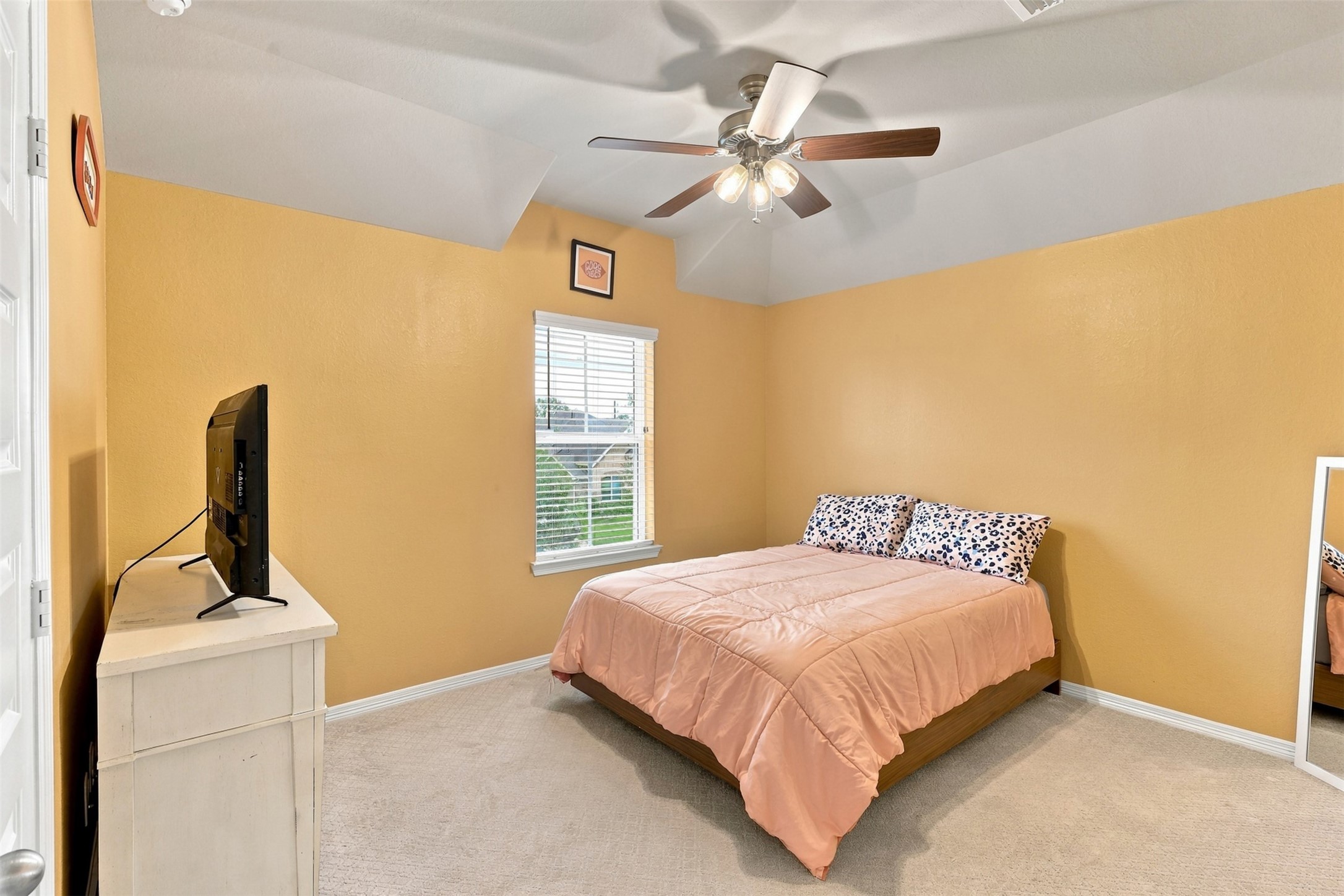 WOW! THIS GUEST BEDROOM HAS A SECRET! Step inside this AMAZING guest bedroom featuring impressive high ceilings and a wonderful sense of space! But WAIT... the real surprise is hidden inside the WALK-IN CLOSET! Discover a SECRET ROOM that offers endless possibilitiesa magical little playhouse, a fun hideaway, or that extra storage space you've always wanted!