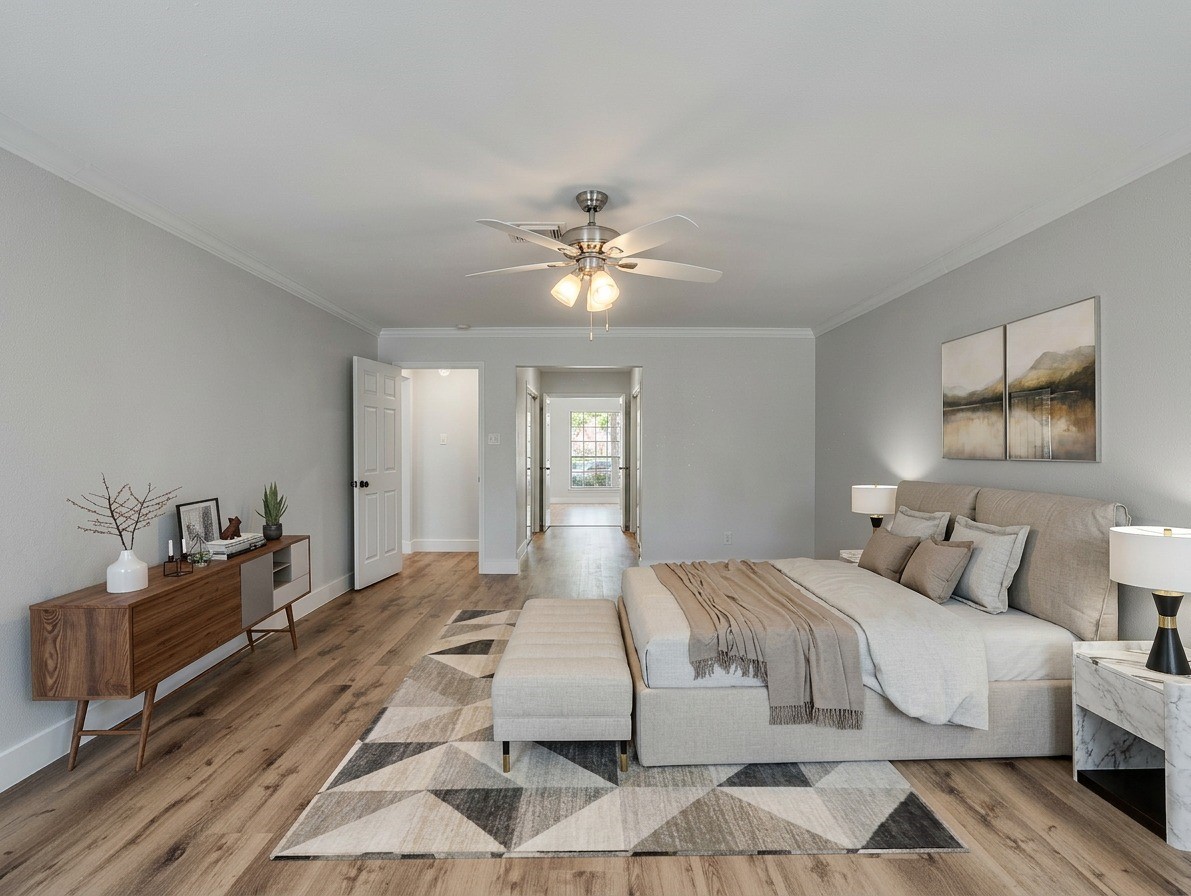 Virtually staged to highlight the spacious primary suite and its potential layout