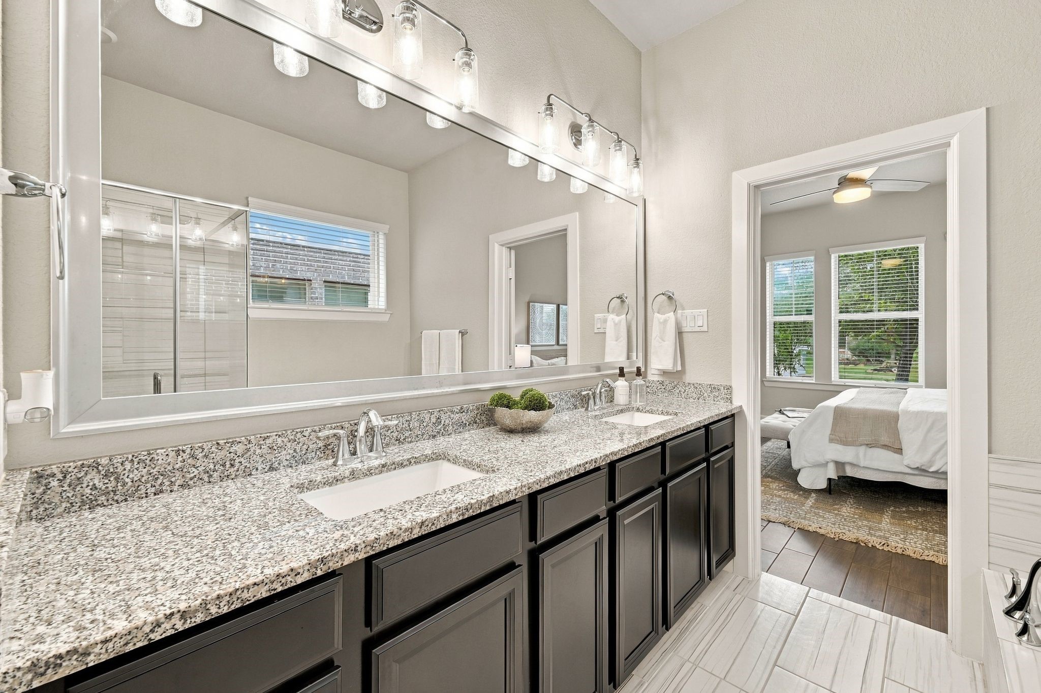 Granite counters, dual sinks, direct access to the primary bedroom. No sharing sinks in this house.