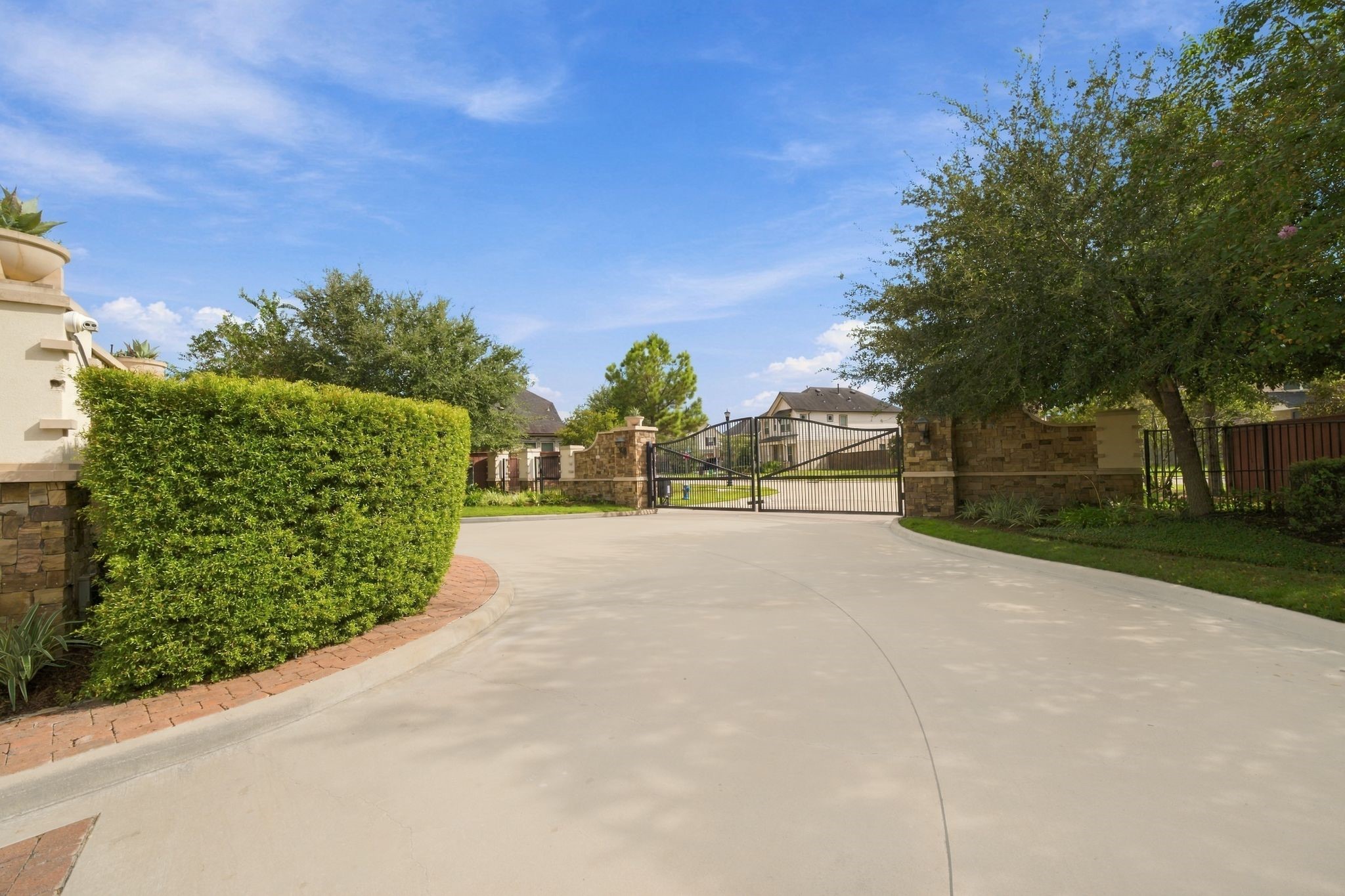 Gated, landscaped, and secure. This is what buying into a community actually means.