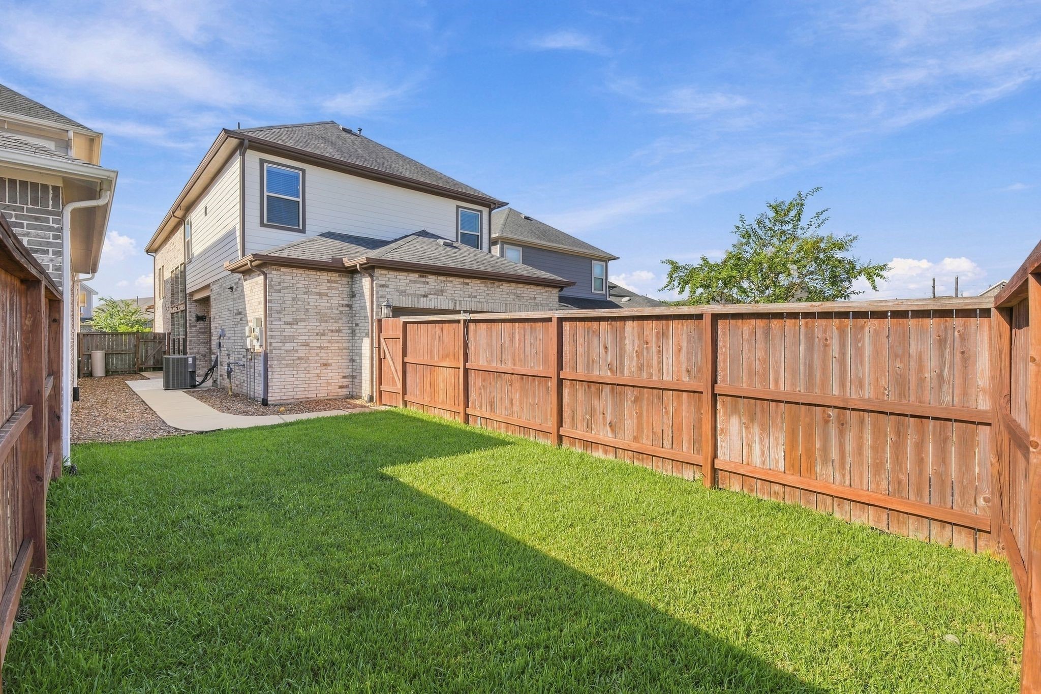 Quiet, private, fenced in. The backyard does its job without asking for attention.
