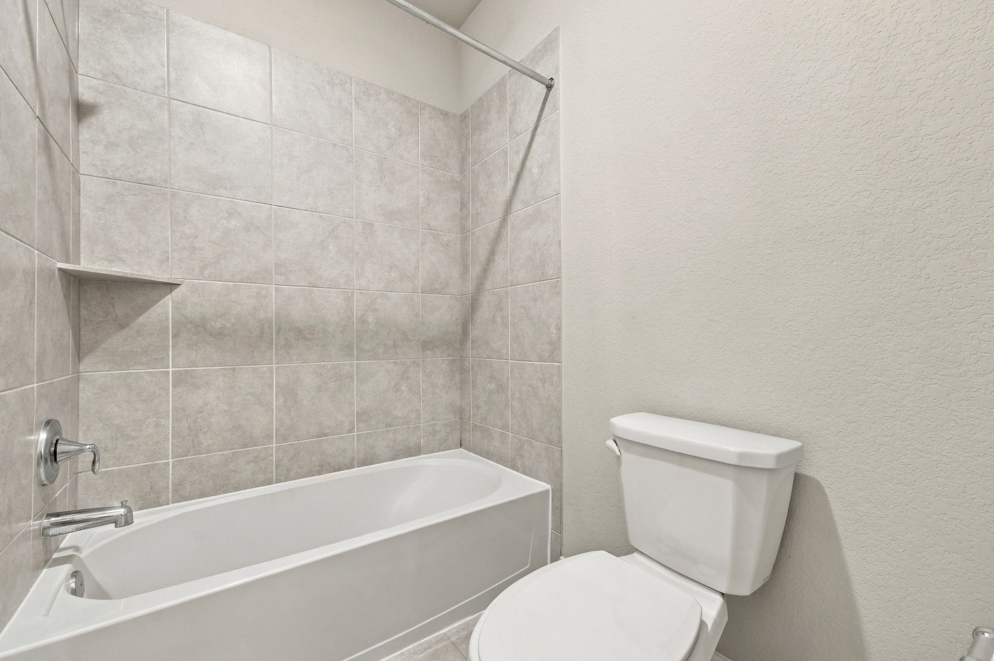 Tile surround, a deep soaking tub. Simple, clean, done right.