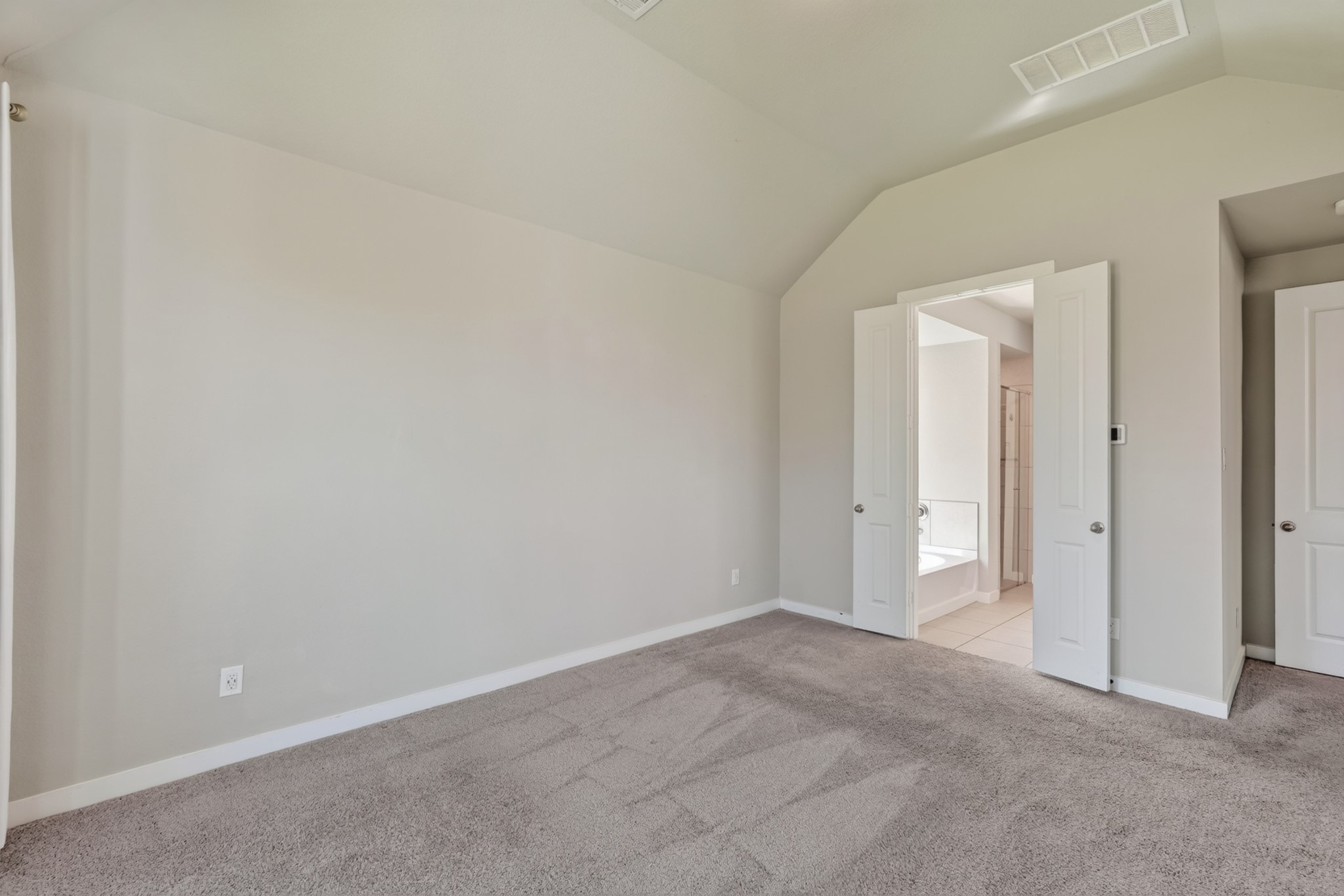 A versatile flex space off the main living area is ideal as a home office, formal dining room, or study. Light and bright with neutral walls and quality flooring, this bonus room adds genuine flexibility and everyday value to this already exceptional home.