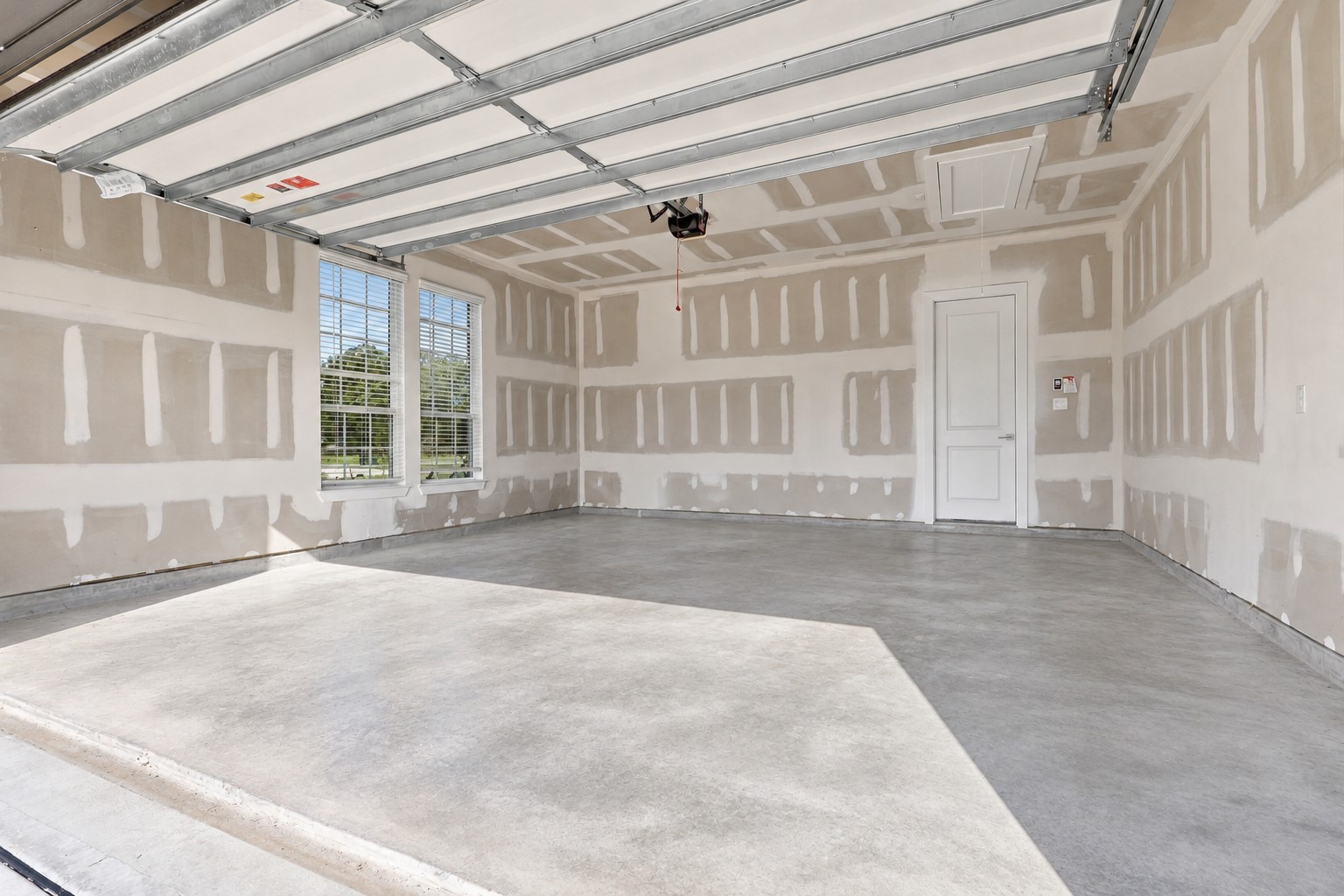 NOT YOUR ORDINARY GARAGE! This IMPRESSIVE ATTACHED GARAGE features EXTRA-DEEP DIMENSIONS, offering WONDERFUL SPACE for your vehicles, tools, storage & everyday essentials! Imagine the possibilities with all that EXTRA ROOM for organizing, hobbies, or creating your own workshop area! Whether you need additional storage or simply appreciate having room to spread out, this SPACIOUS GARAGE delivers CONVENIENCE, FLEXIBILITY & FUNCTIONALITY! ANOTHER FANTASTIC FEATURE OF THIS BEAUTIFUL HOME!