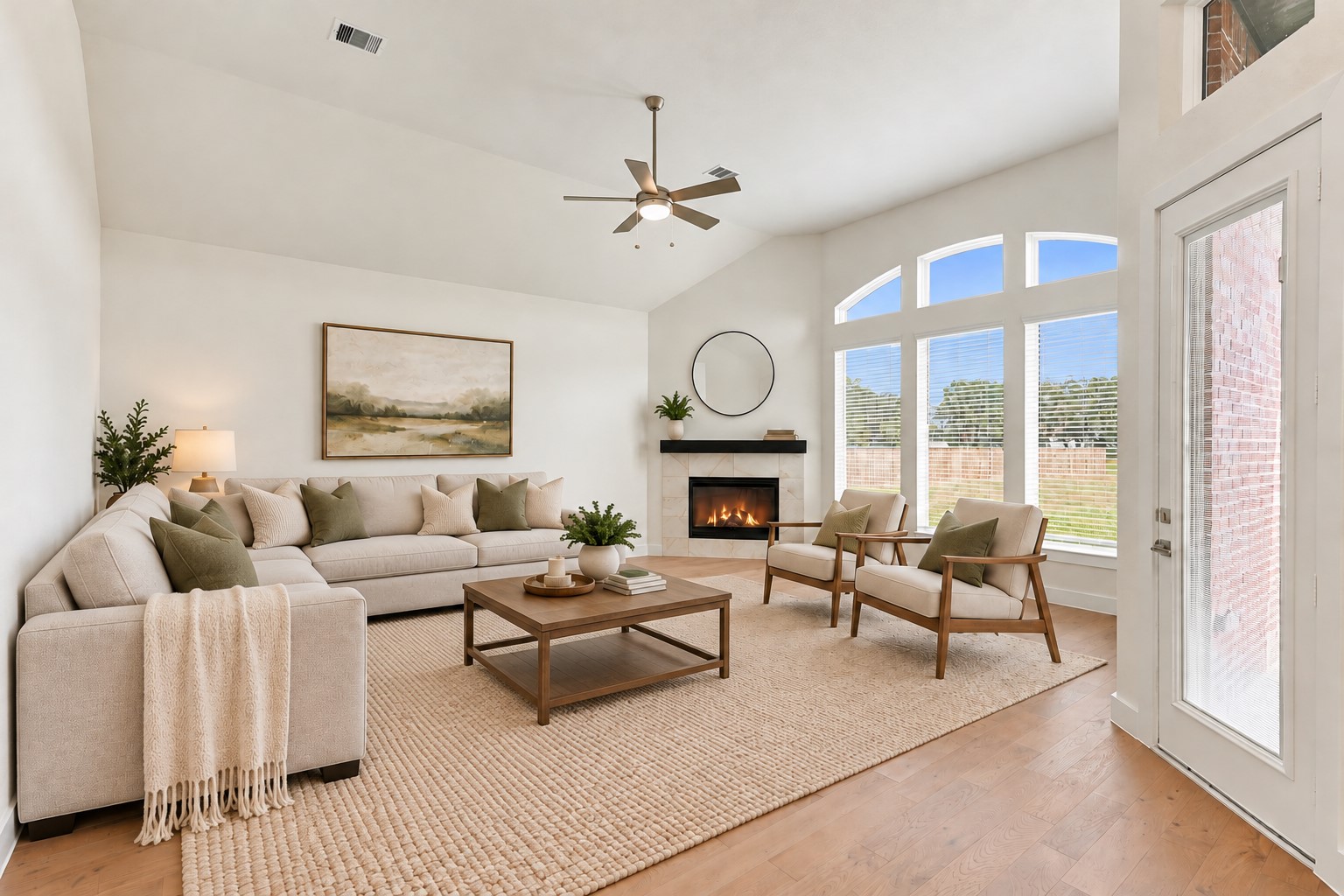 WOW FACTOR IS IN THE WINDOWS! Prepare to be AMAZED by this SPECTACULAR FAMILY ROOM showcasing SOARING CEILINGS, a DRAMATIC ARCHED TRANSOM WINDOW & TOWERING WALL OF WINDOWS that fills the room with GORGEOUS NATURAL LIGHT! A CHARMING CORNER FIREPLACE creates the perfect focal point for cozy evenings, while BEAUTIFUL FLOORING adds warmth, elegance & timeless style! Imagine gathering with loved ones for the holidays, entertaining friends, or simply relaxing in this BREATHTAKING SPACE! Virtual Stage!