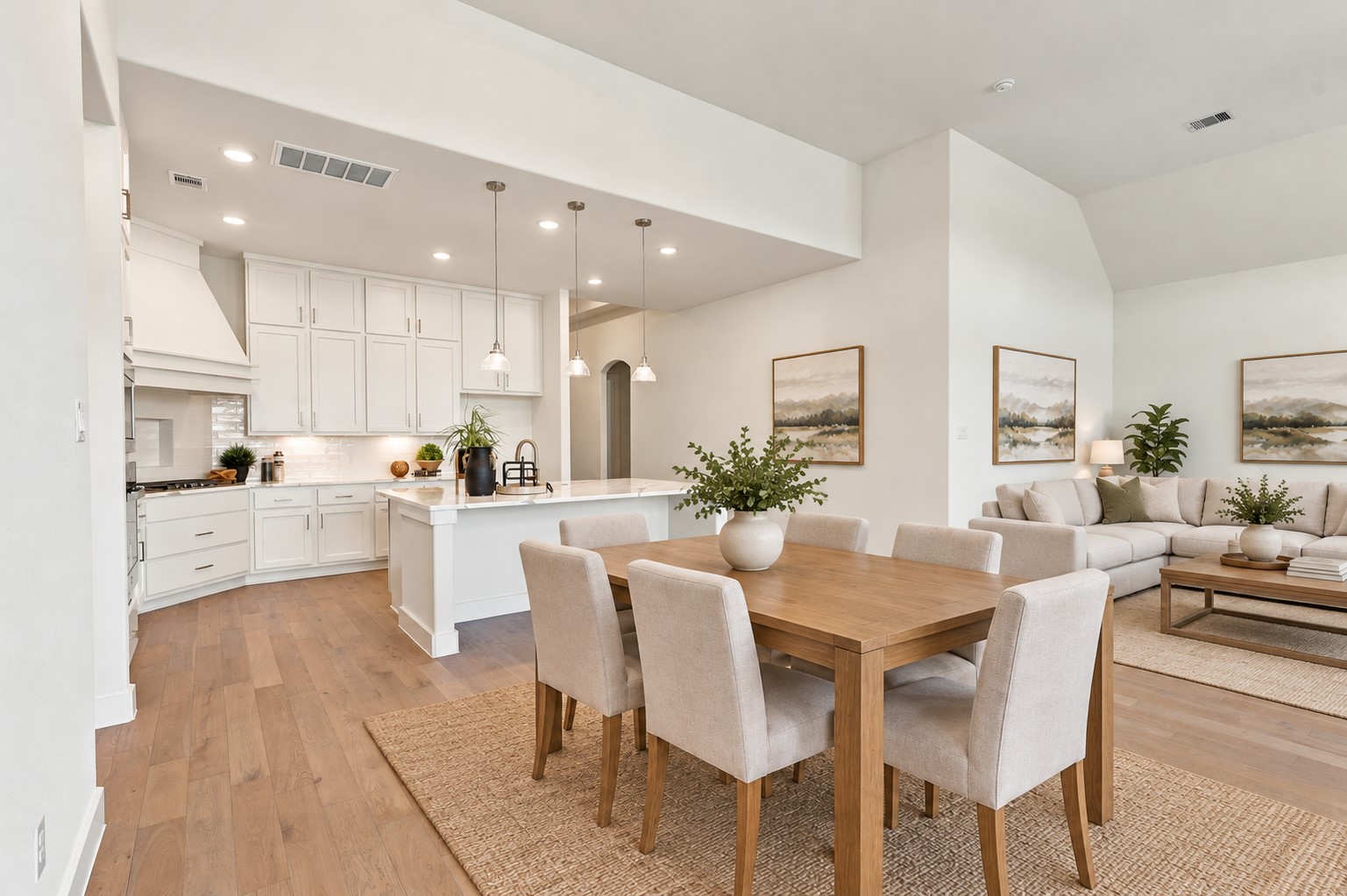 THE PERFECT SETTING FOR GATHERING & ENTERTAINING! This SPECTACULAR dining area features a spacious layout, beautiful engineered wood flooring, and an elegant light fixture! The open-concept design connects effortlessly with the gourmet kitchen and family room, creating the PERFECT space for family meals, holiday celebrations, and entertaining friends! **Photo is Virtually Staged**
