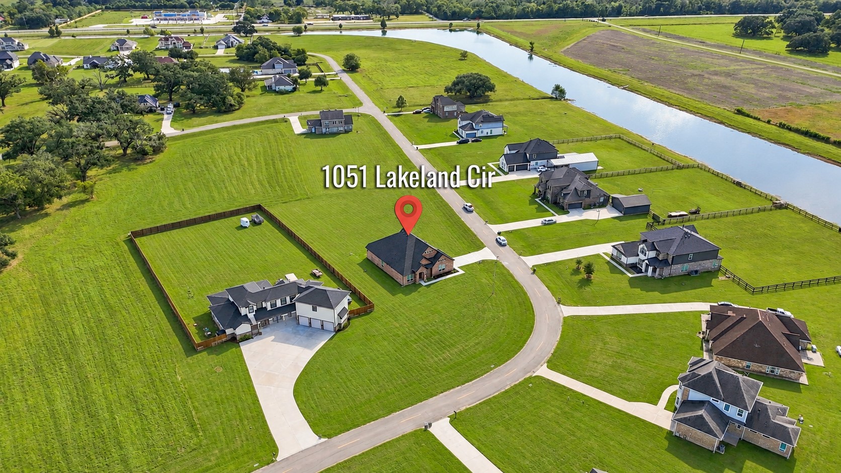 WOW! WHAT A SPECTACULAR BIRD'S-EYE VIEW! Prepare to be AMAZED by this INCREDIBLE AERIAL PERSPECTIVE showcasing your IMPRESSIVE ONE-ACRE PROPERTY surrounded by beautiful custom homes! Just LOOK at that EXPANSIVE GREEN LAWN & ALL THAT WONDERFUL OPEN SPACE! Imagine the possibilitiesyour DREAM GARDEN, outdoor entertaining area, or simply room to roam & enjoy the peaceful surroundings! Experience the BEAUTY OF COUNTRY-STYLE LIVING with space between neighboring homes! A TRULY SPECIAL PLACE TO CALL HOME!