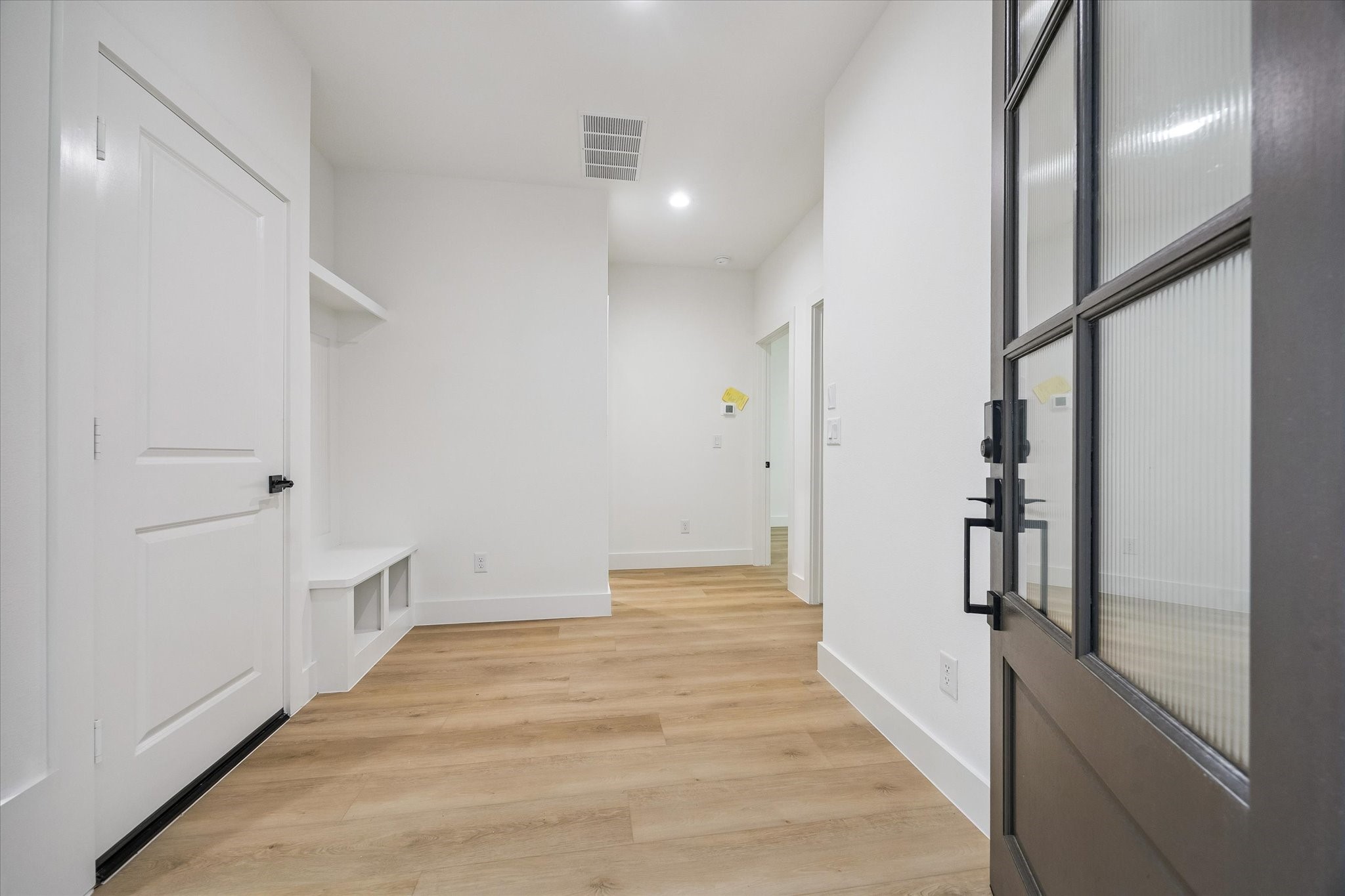 Functional first-floor arrival space with natural light and storage Functional first-floor arrival space with natural light and storage