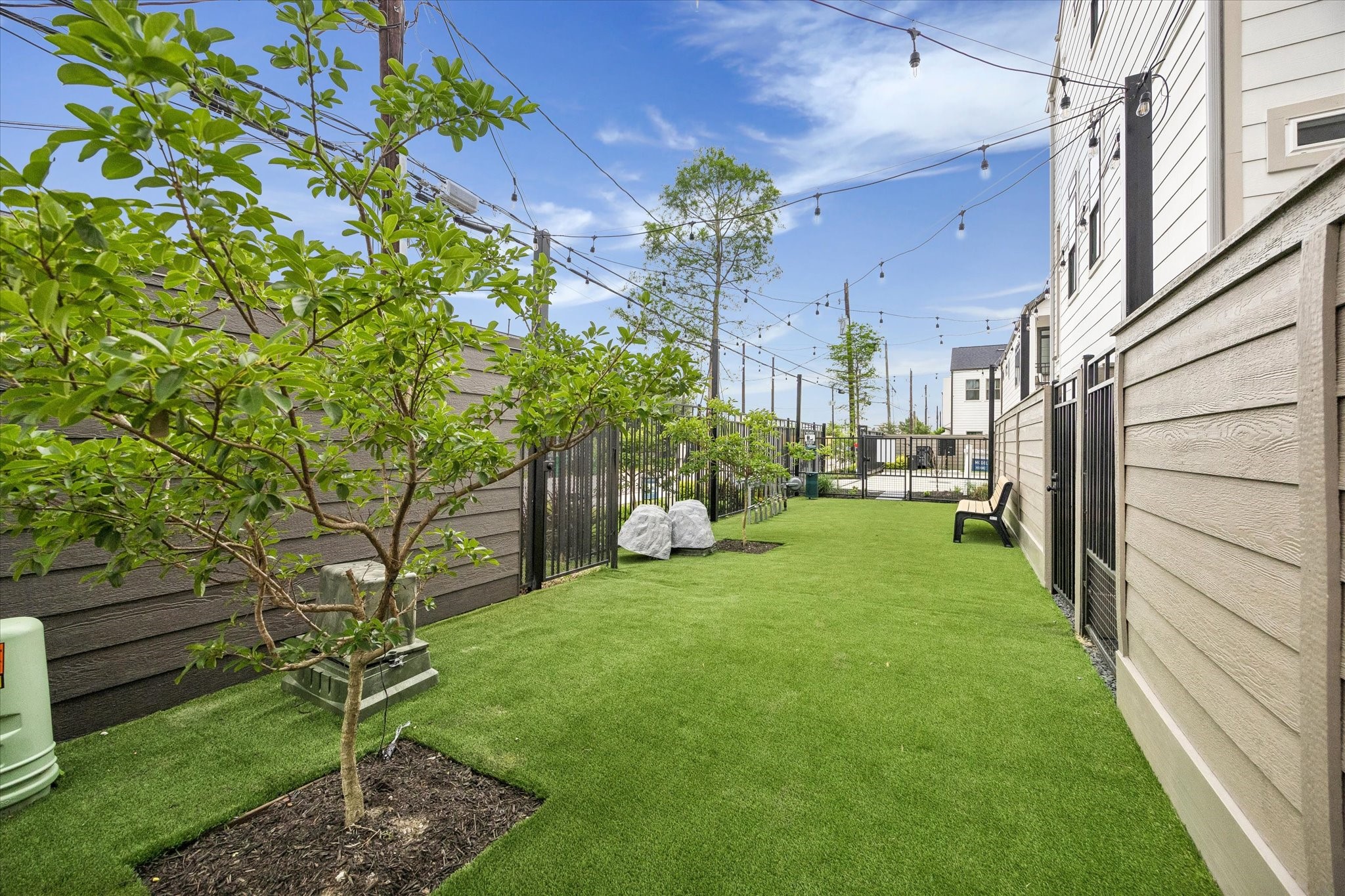 Private green space designed for pets, play, and outdoor relaxation