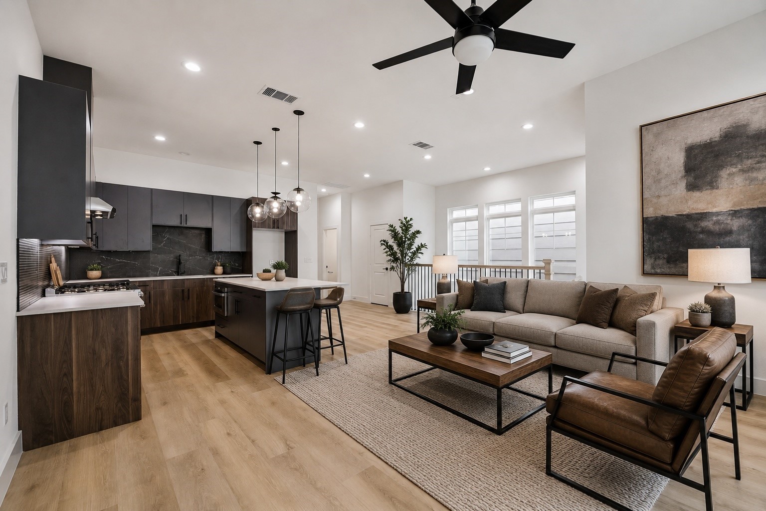 Open-concept view connecting kitchen, dining, and living spaces Open-concept view connecting kitchen, dining, and living spaces