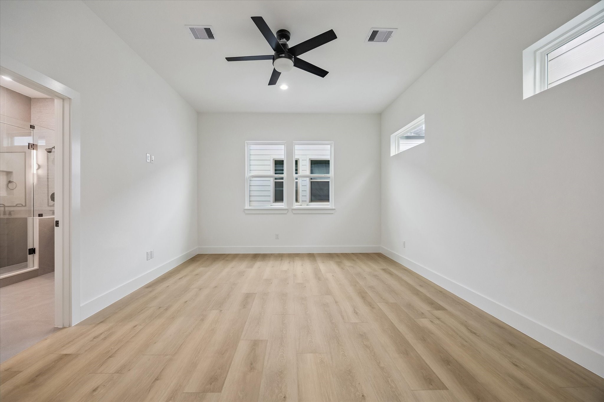 Versatile room ideal for bedroom, office, nursery, or guest space