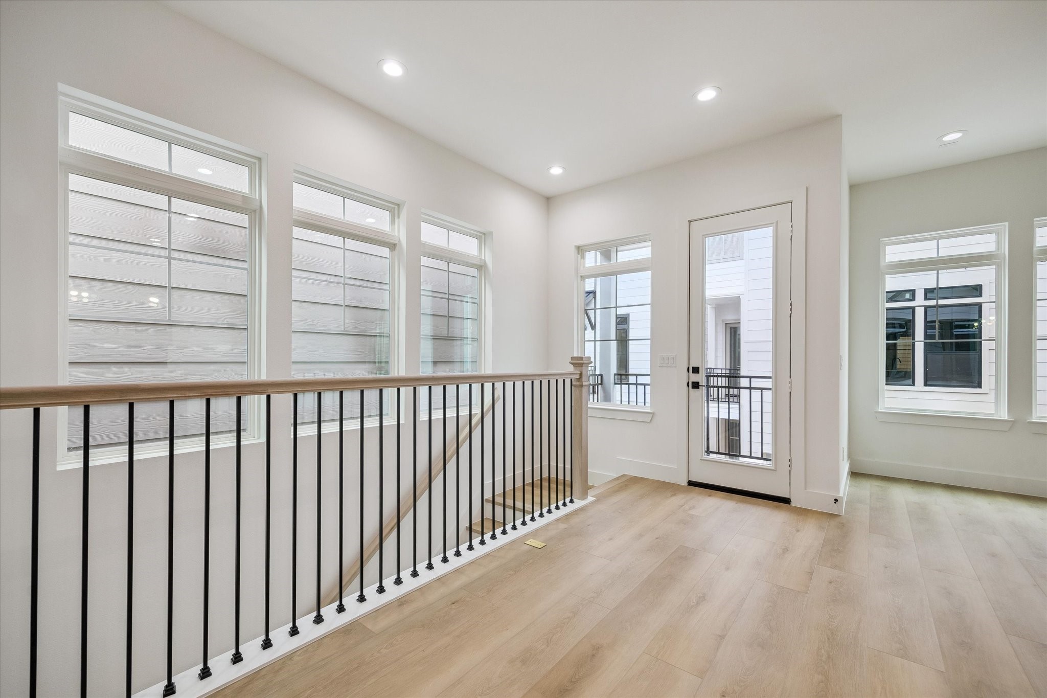 Airy upstairs landing offering flexible use and generous window light Airy upstairs landing offering flexible use and generous window light