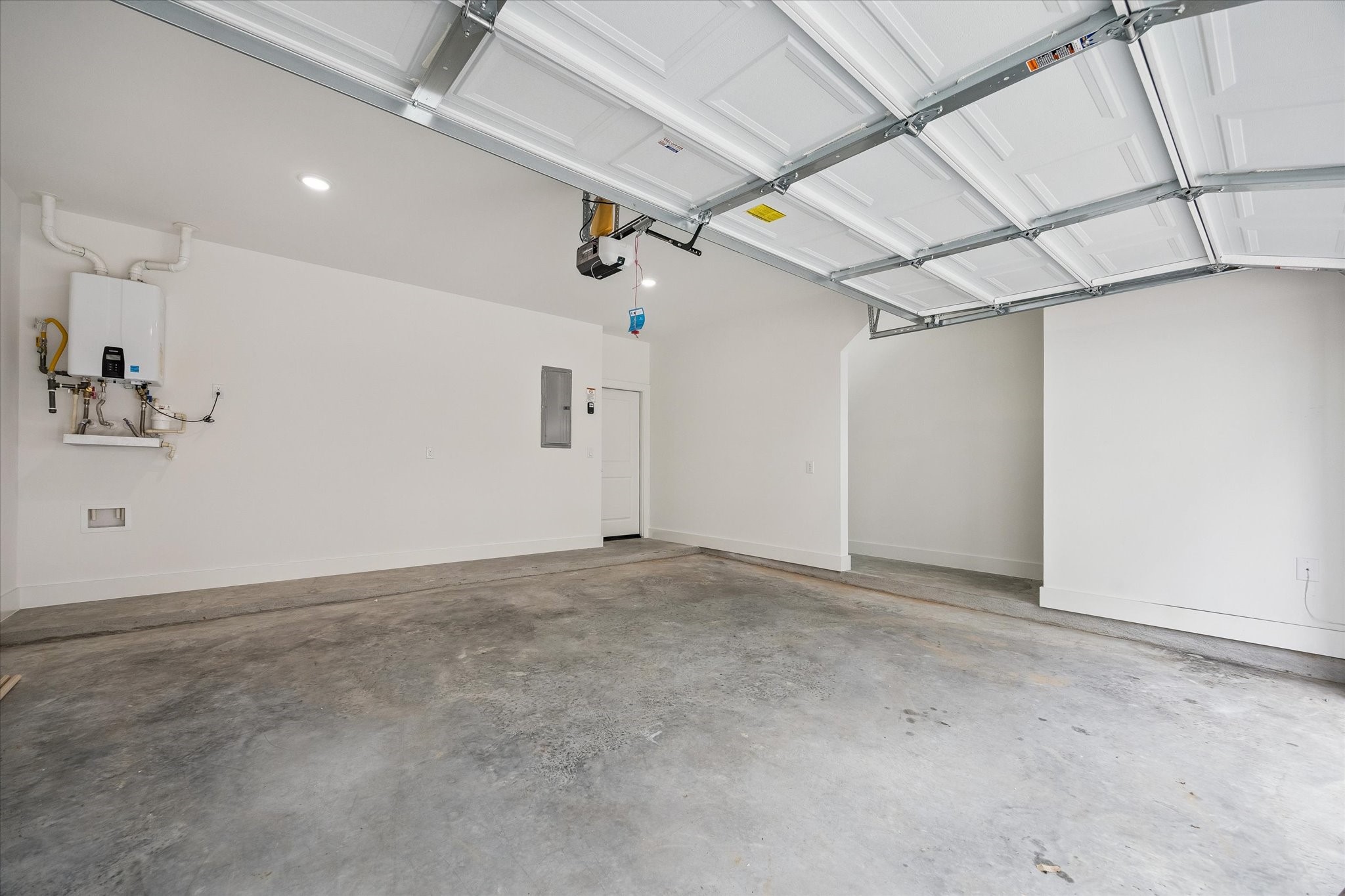 Private attached garage offering secure parking and storage flexibility