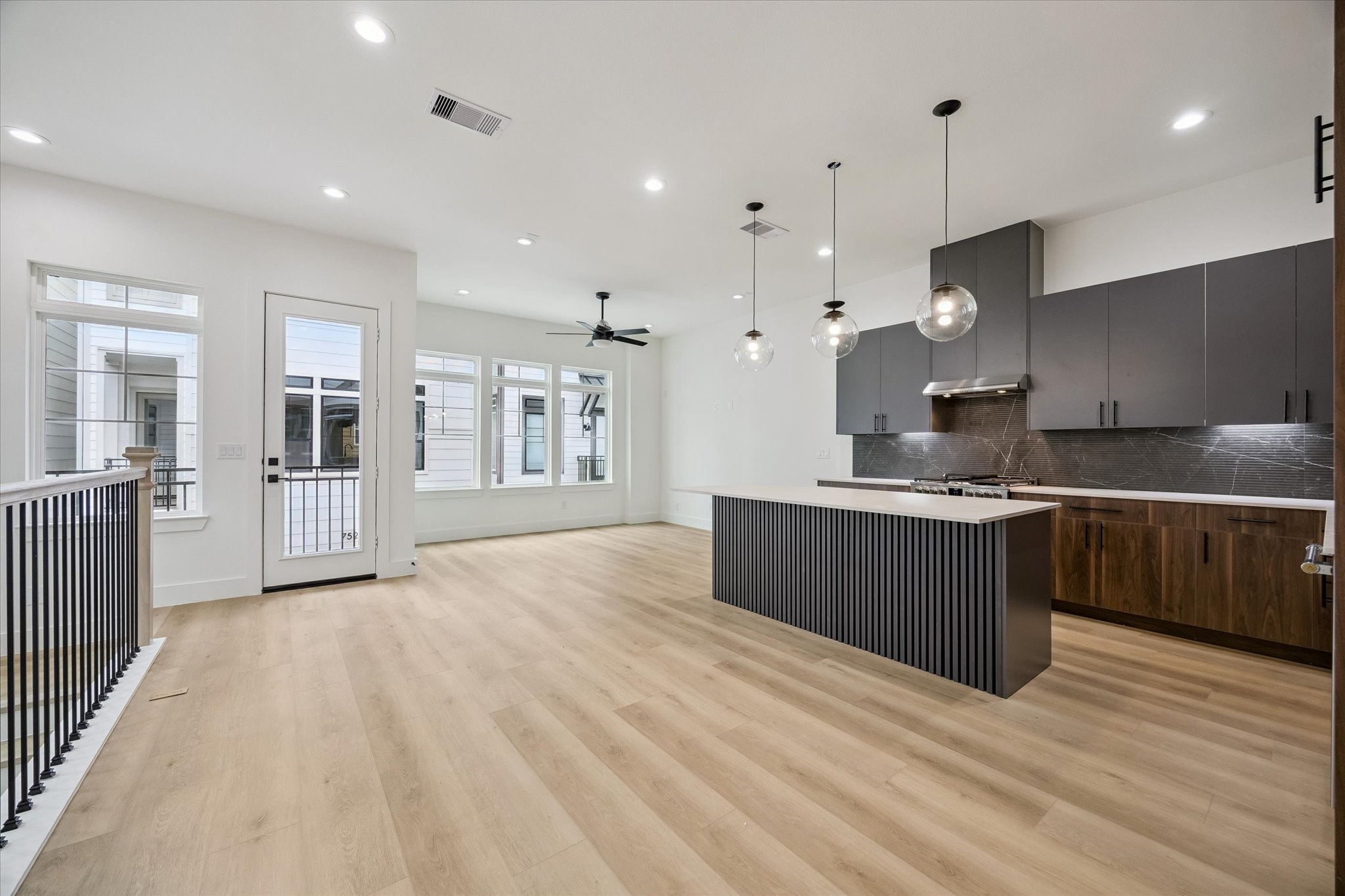 Wide-open main living space with kitchen, dining, and entertaining flow Wide-open main living space with kitchen, dining, and entertaining flow