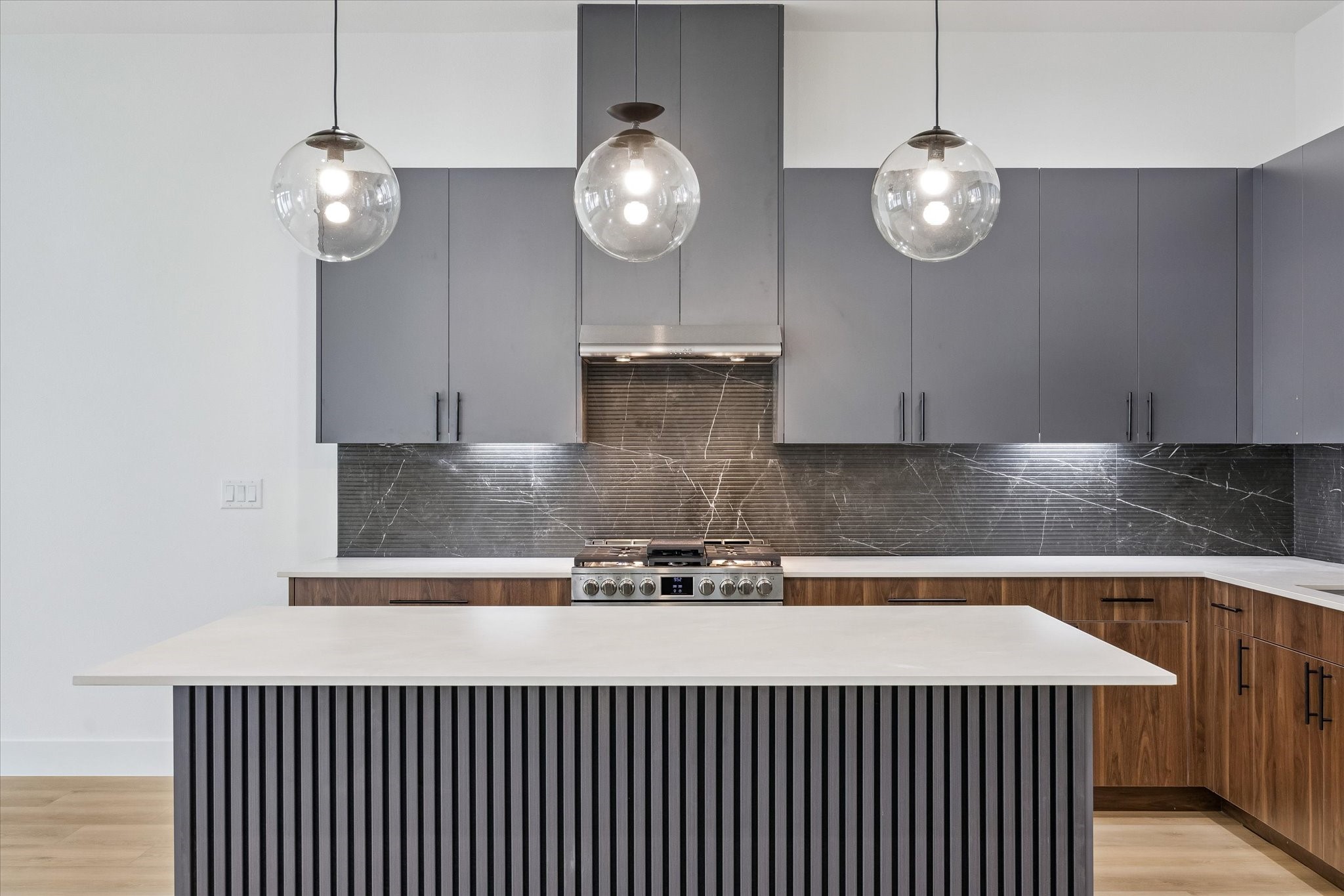 Statement island anchoring the kitchen with elevated visual impact