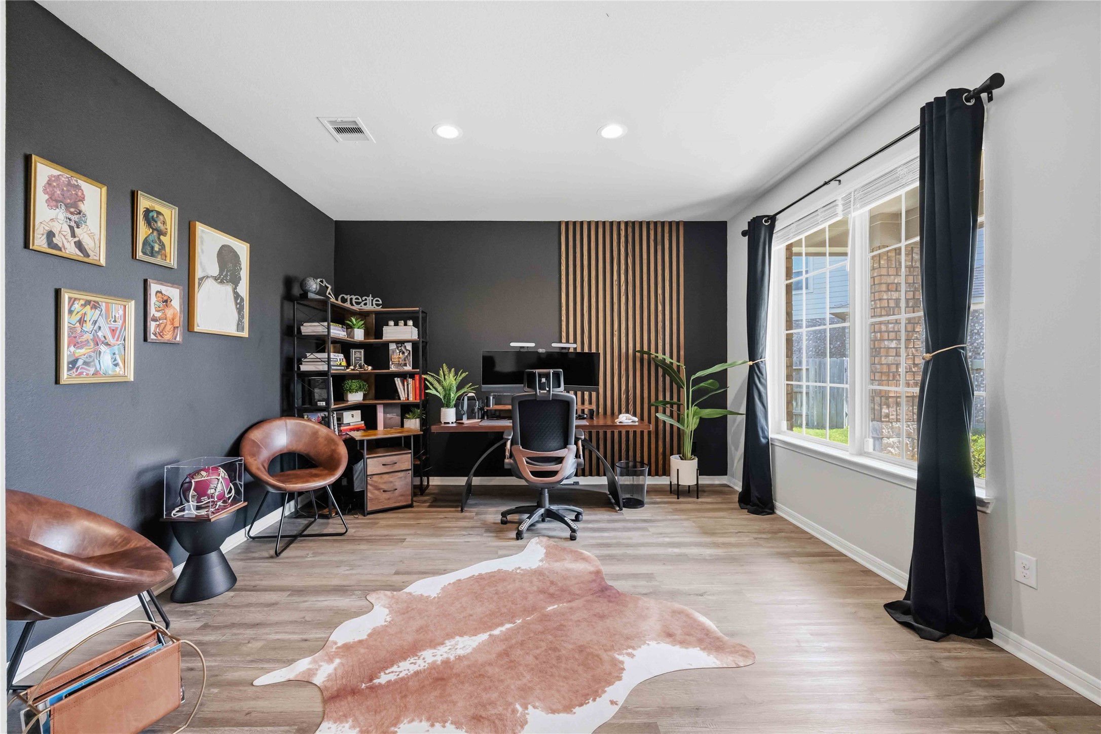 Lot's of Natural light in this Flex space. Make it a formal dining or study.