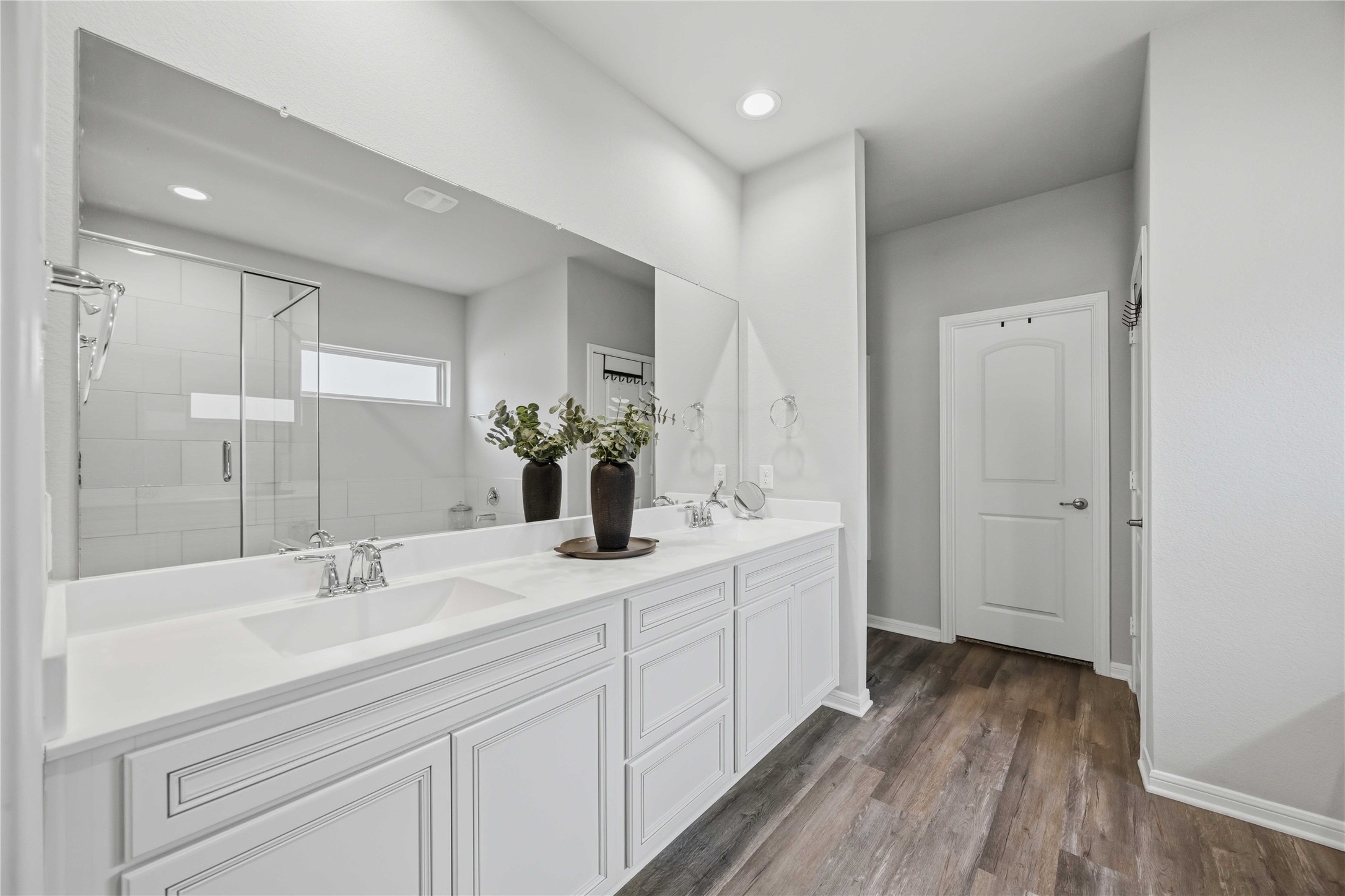Spacious Primary On suite with double sinks.