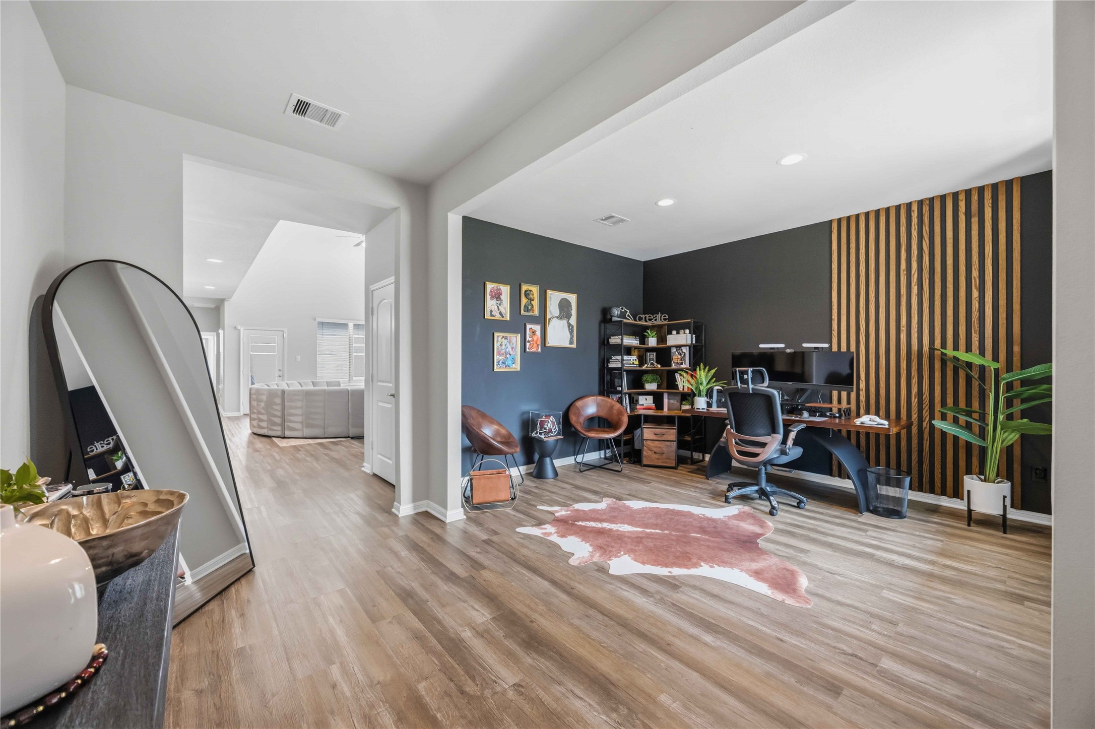 Open and airy entrance with a Flex space for formal dining or Office Space