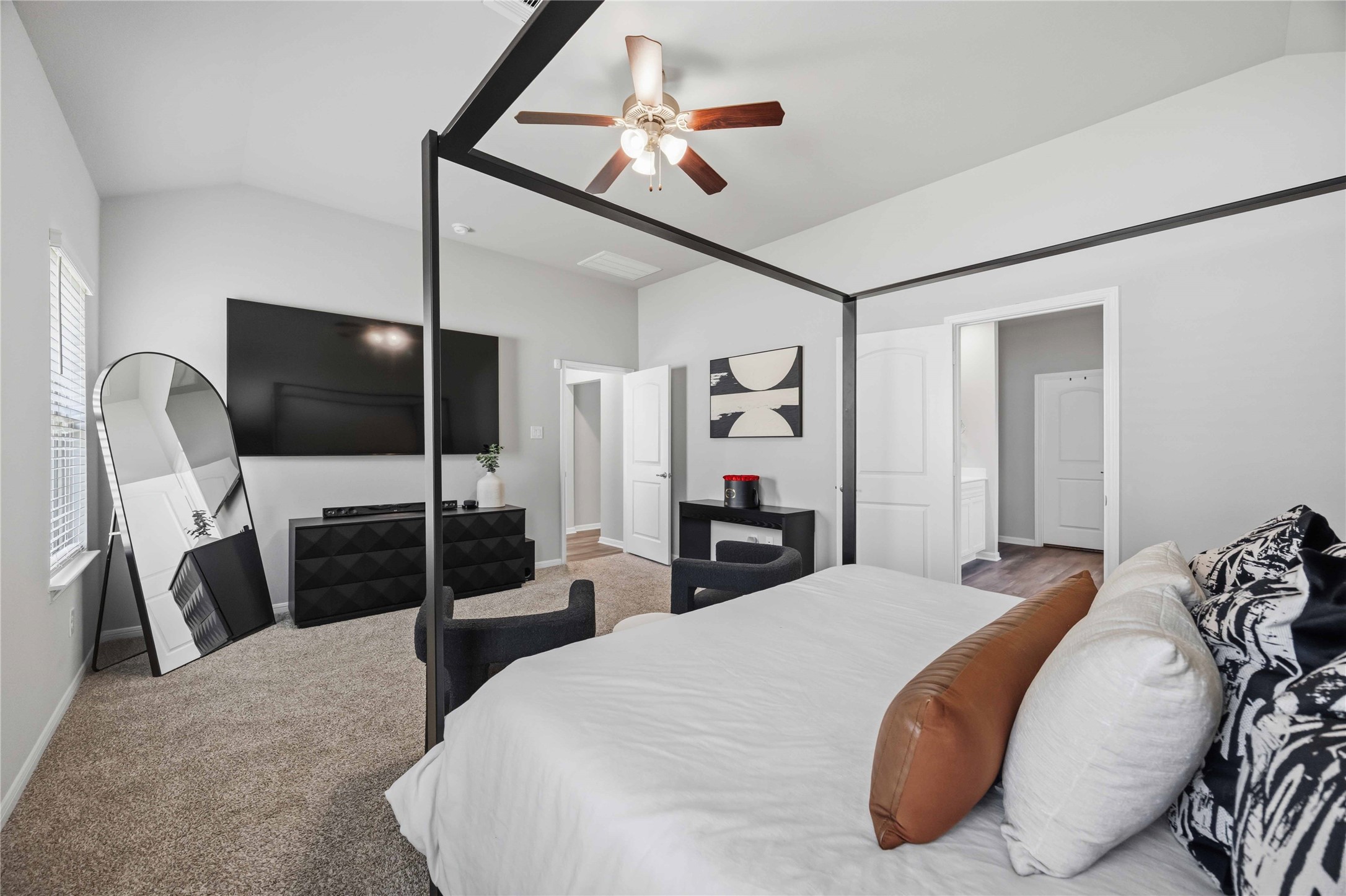 Primary bedroom has plenty of space for a King bed and big furniture.