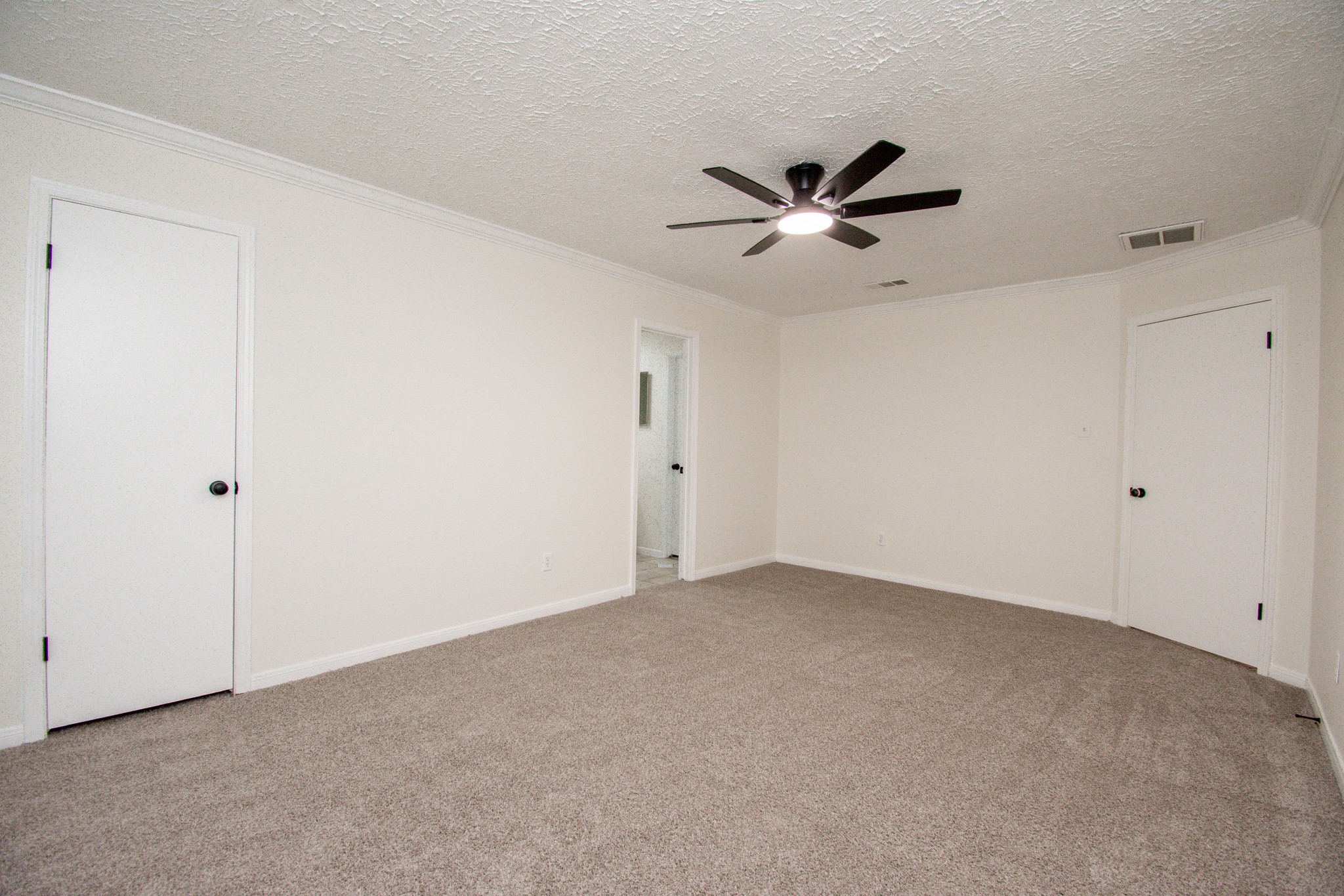 Primary bedroom with new carpet