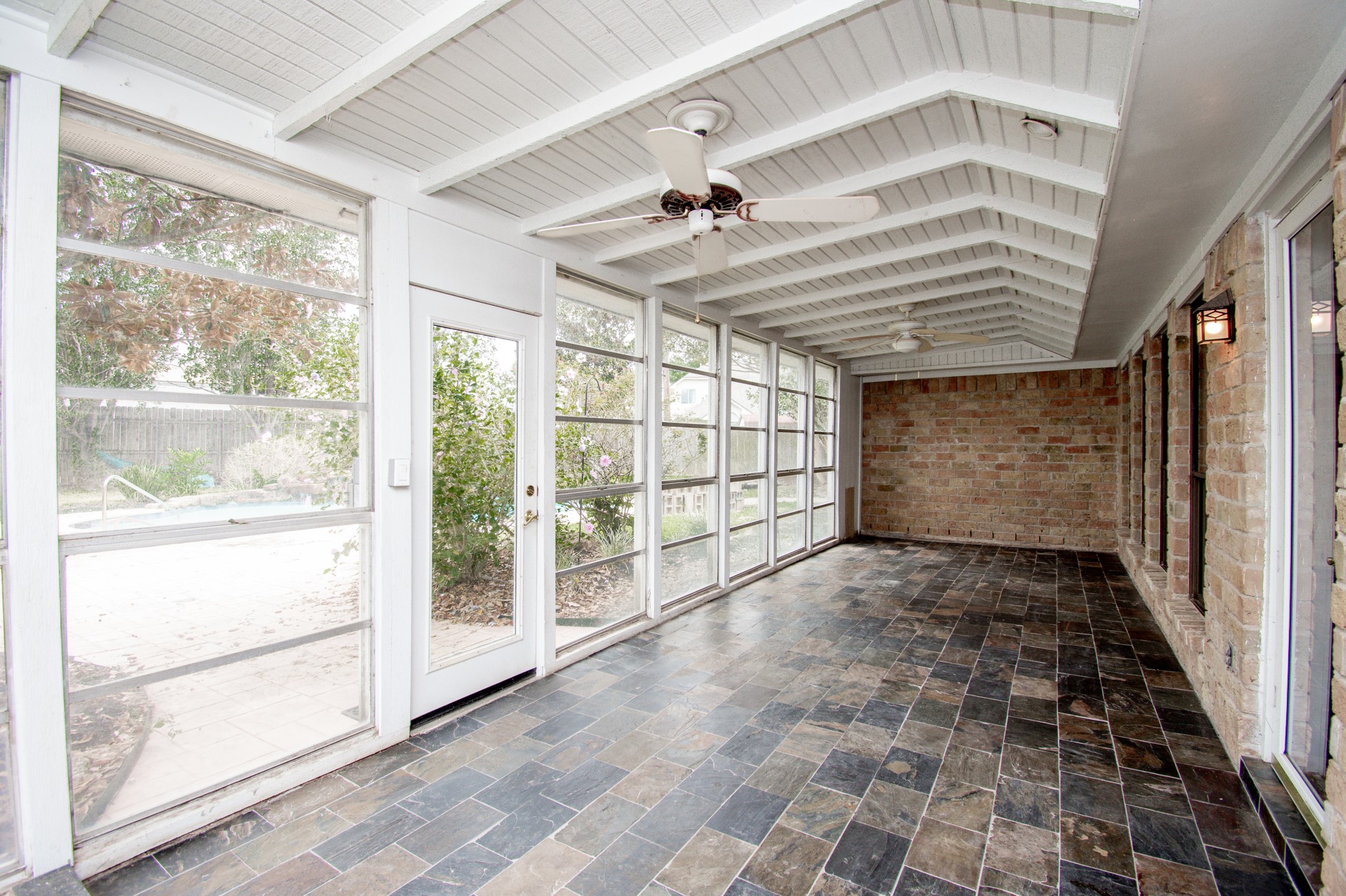 Enclosed Sunroom Patio with new slate tile floors