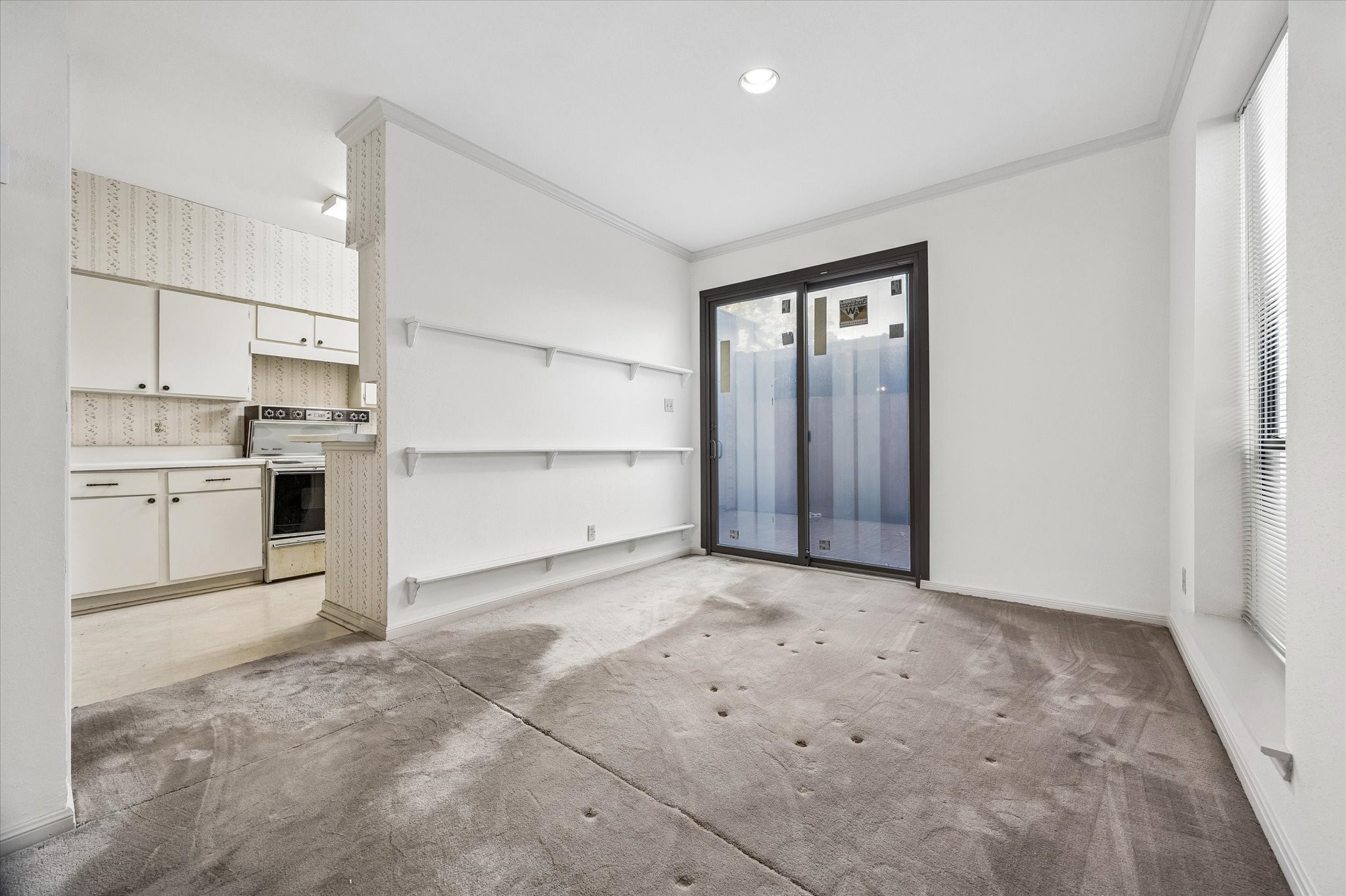 Recently replaced back doors open to the private back patio