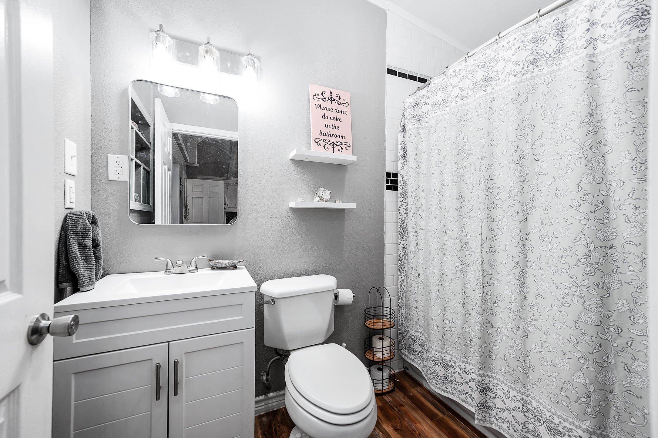 Hall bath with updated vanity.