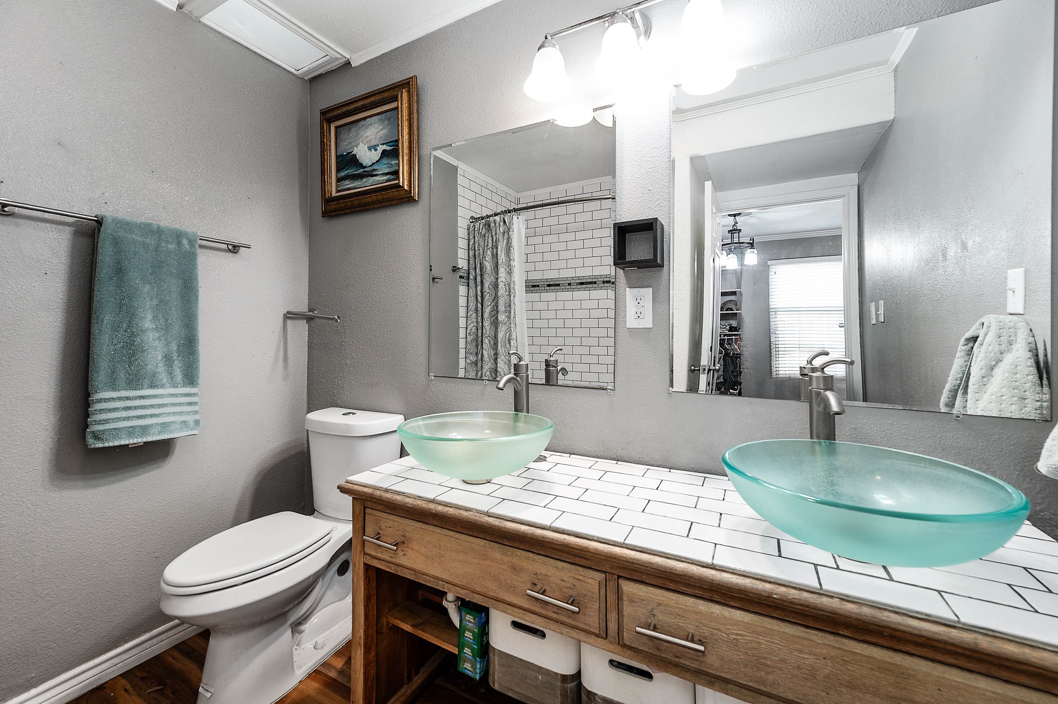 Primary bath with dual vessel sinks.