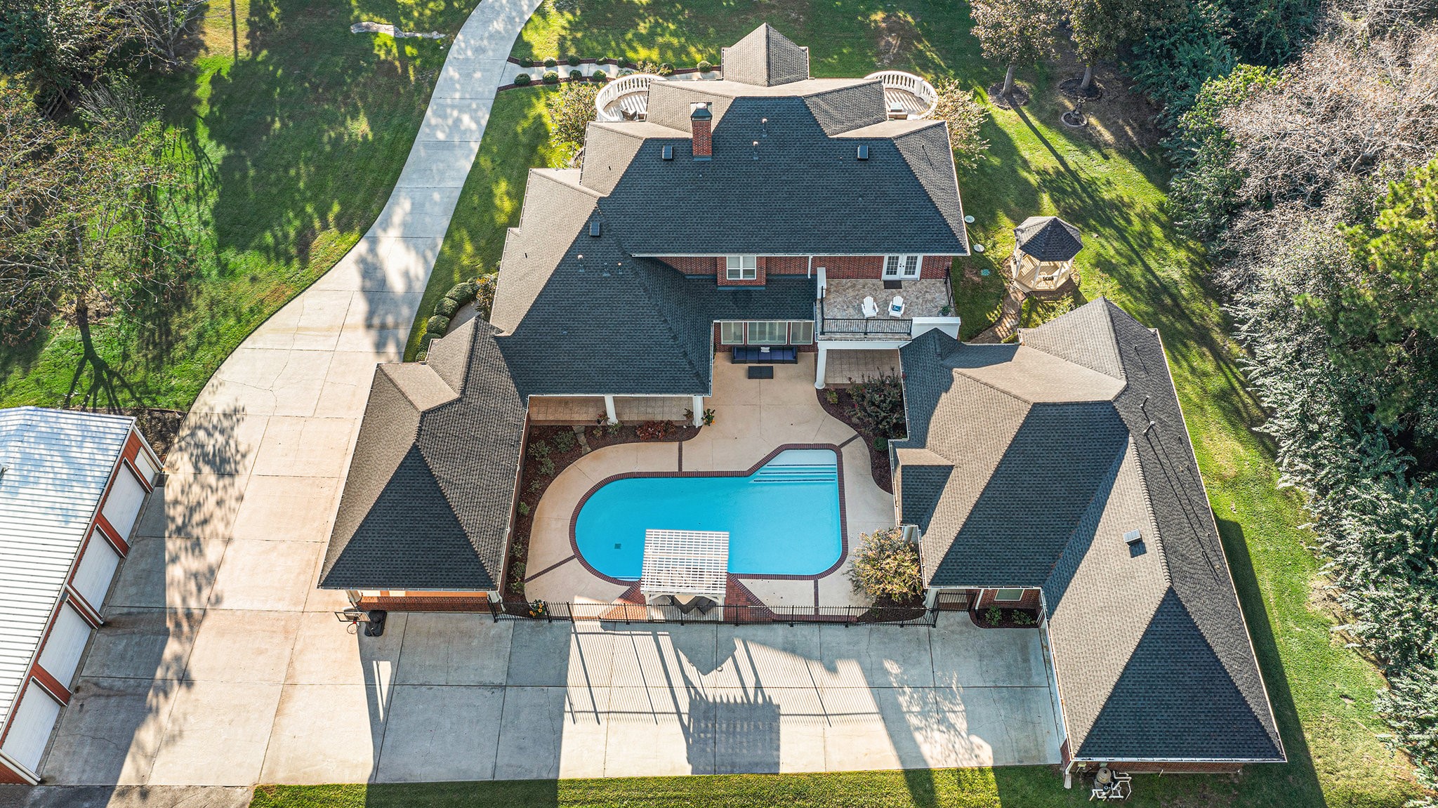 Full aerial view of the backyard paradise.