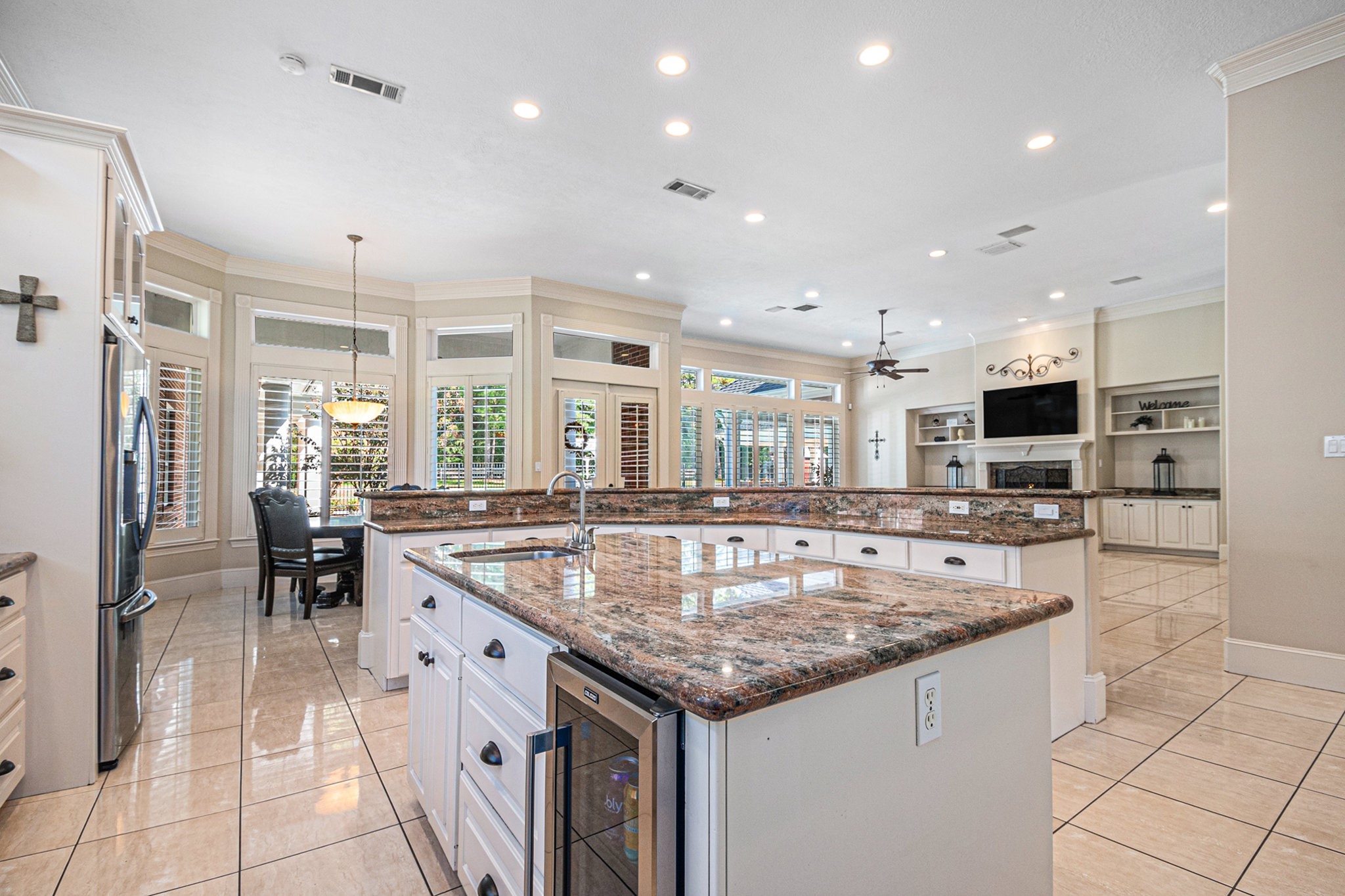 Other amenities to this astonishing kitchen is the built in mini fridge, a big walk-in pantry, and a breakfast nook.