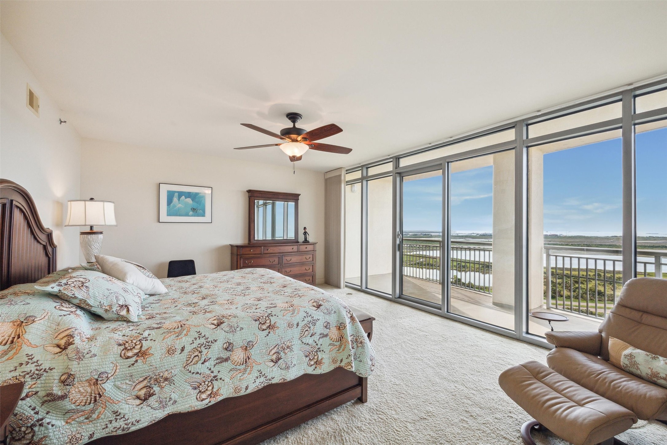 Primary suite overlooking bay views