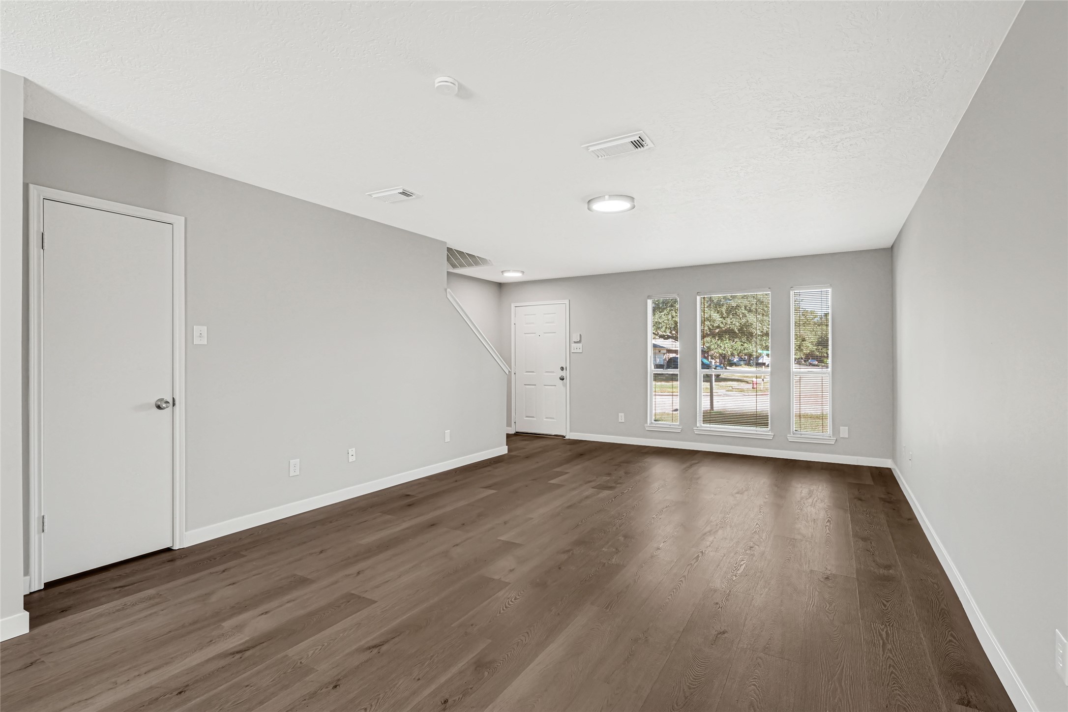 Welcoming interior featuring fresh neutral tones, contemporary finishes, and a spacious floor plan