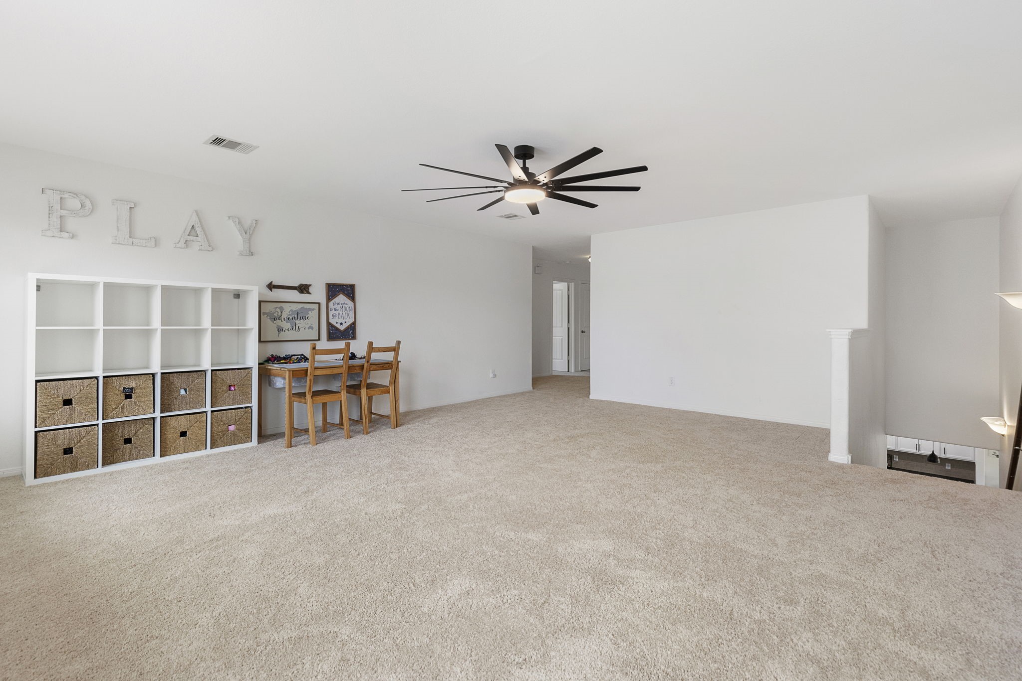 This upstairs gameroom is the highlight of the home with so much space to play plus there is a large walk-in storage room/closet you won't want to miss!