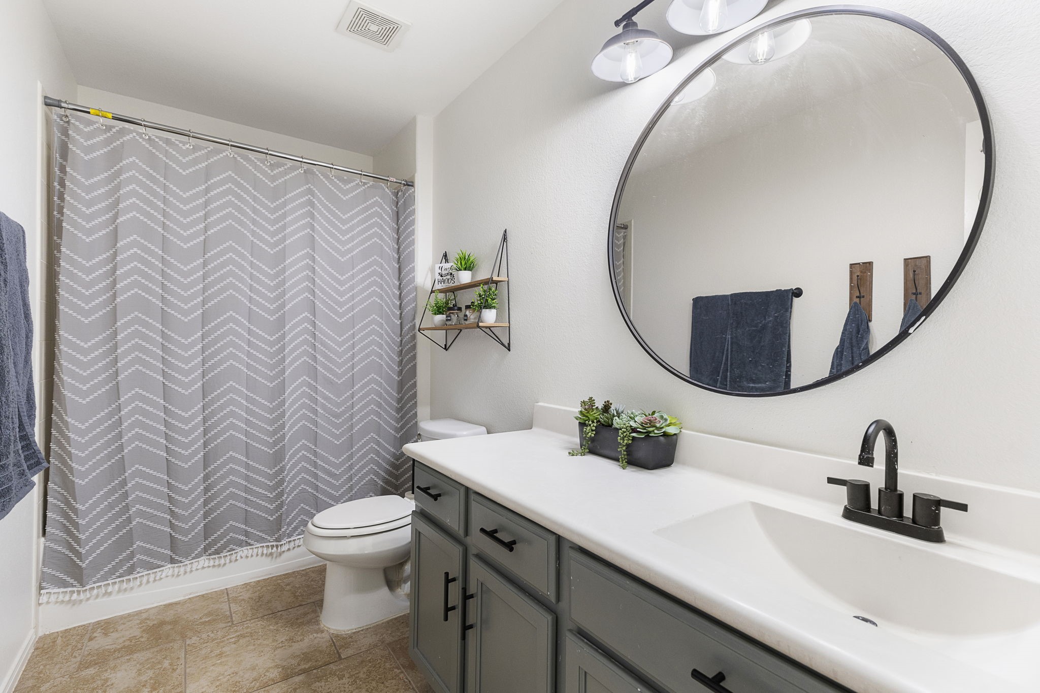 One of two secondary bathrooms upstairs.